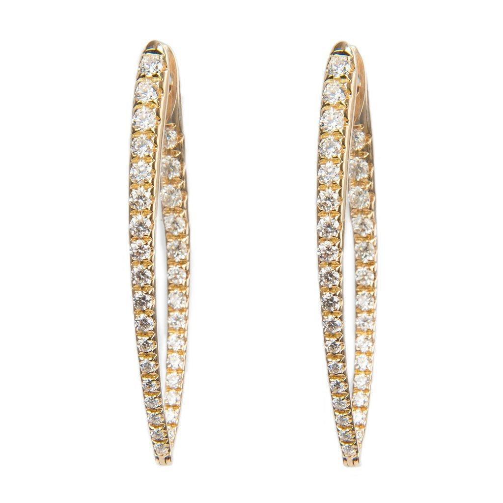 These modern diamond hoops are pure sophistication in a deceptively simple design. With diamonds running down the front and along the inner edge, they’re all the statement you need for day or evening looks.

18K yellow gold
diamonds (2.1 TCW)
Hinged