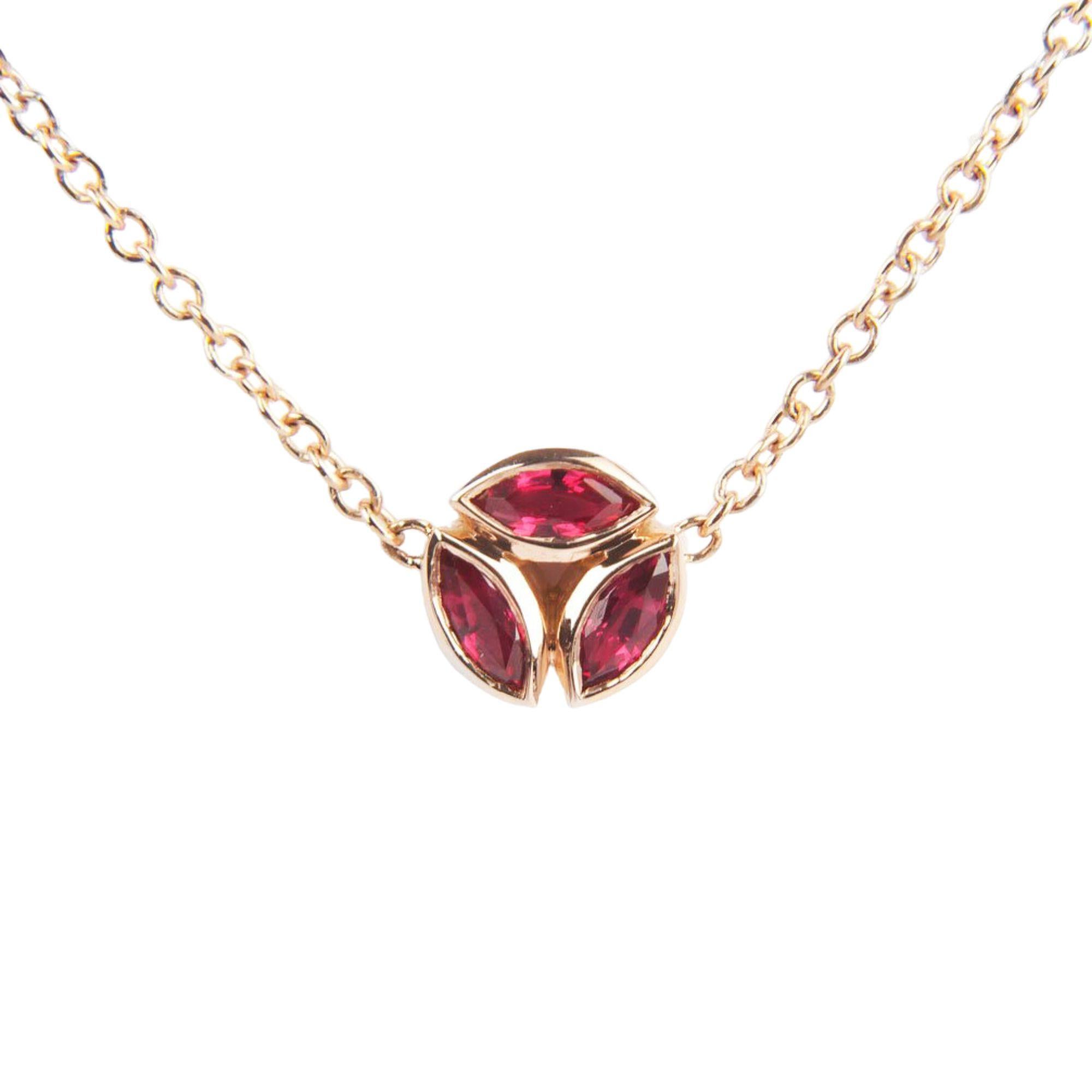 A trio of marquise cut rubies is suspended on a delicate rose gold chain. Ideal for layering.

18K rose gold chain
Bezel set ruby pendant (0.28 TCW)
15 – 16” adjustable chain