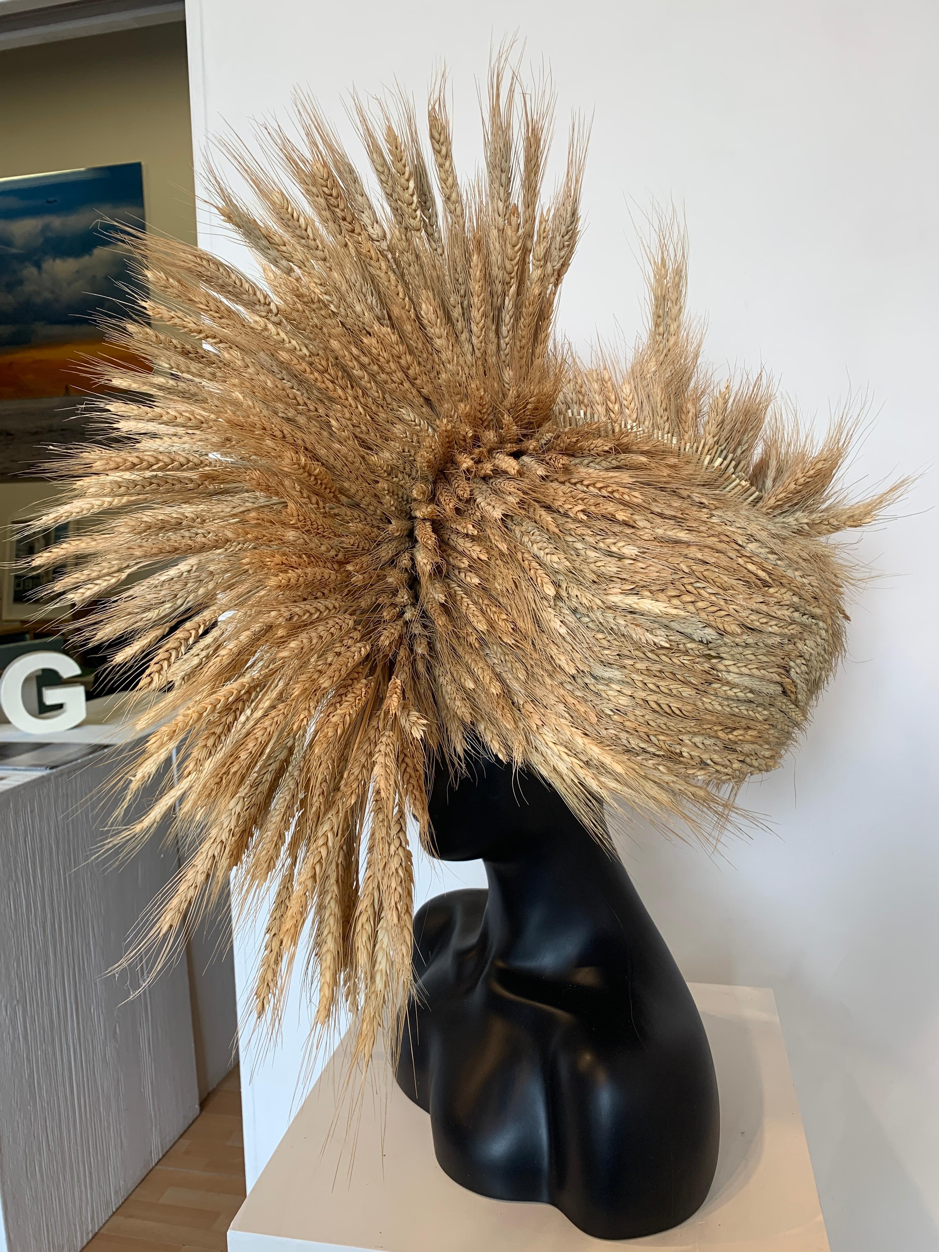 Wearable sculpture created with wheat. Dimensions variable depending upon how the work is displayed.
