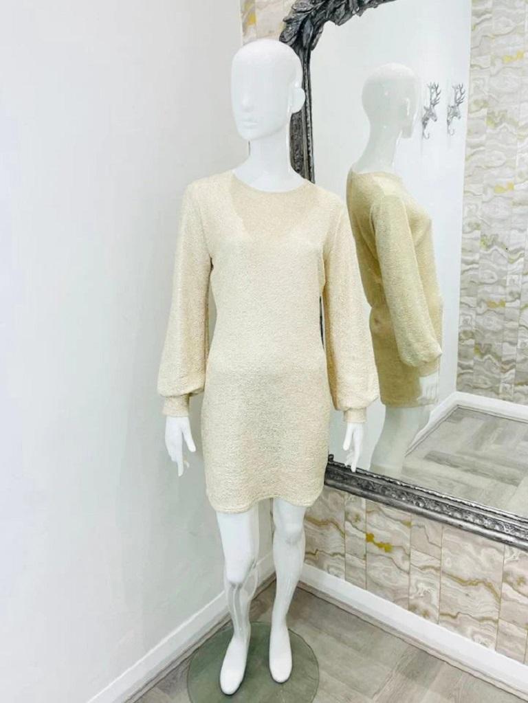 Melissa Odabash Metallic Dress

Cream and gold mini dress.

Additional information:
Size – L
Composition- 92% Polyester, 8% Spandex
Condition – Very Good