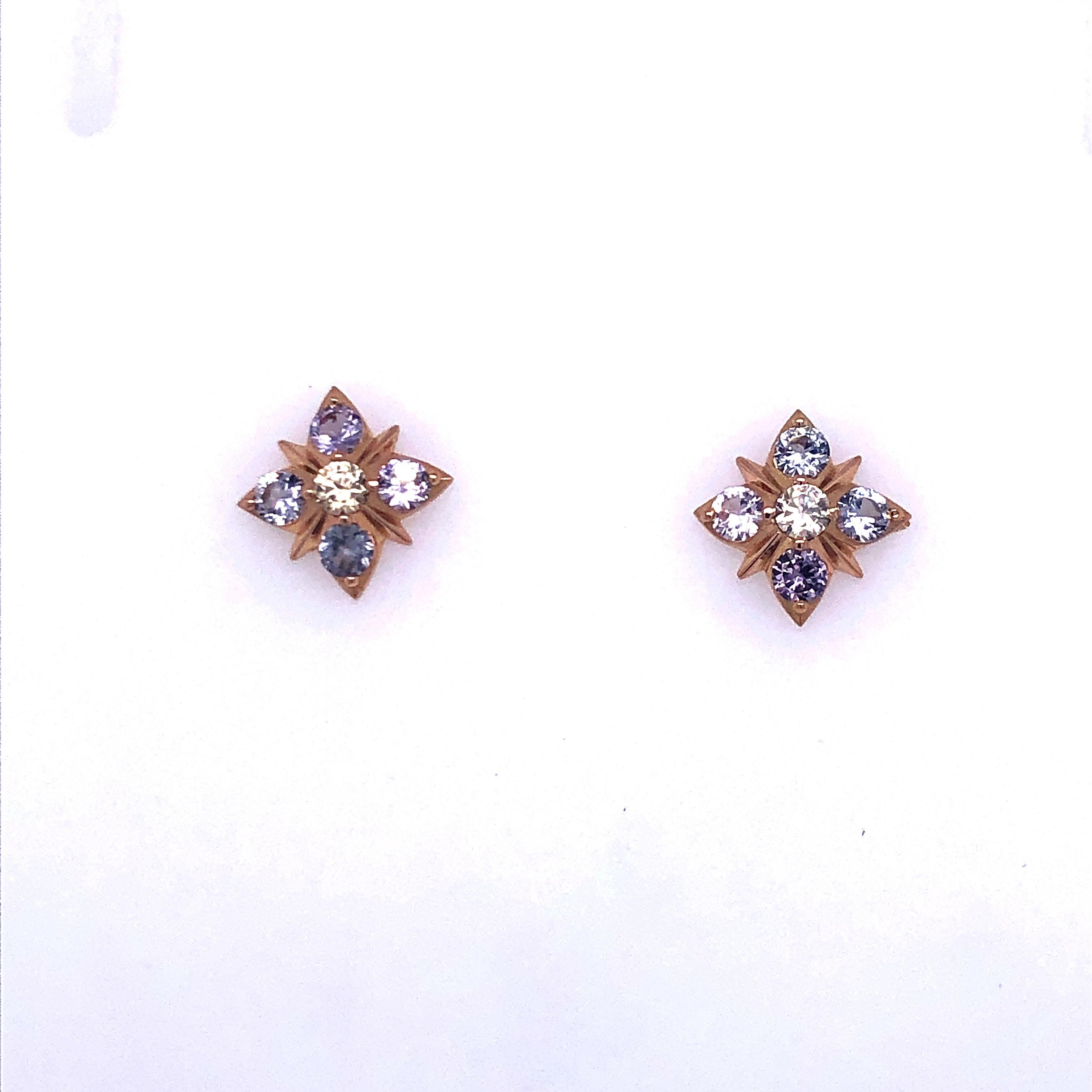 Enchanting Spinel Starburst Earrings from Award Winning Jewelry Designer, Melissa Spencer.  These earrings sparkle and shine and light up your life! 
Four Diamond Cut Spinels in each Rose Gold Starburst Design Stud Earrings.  