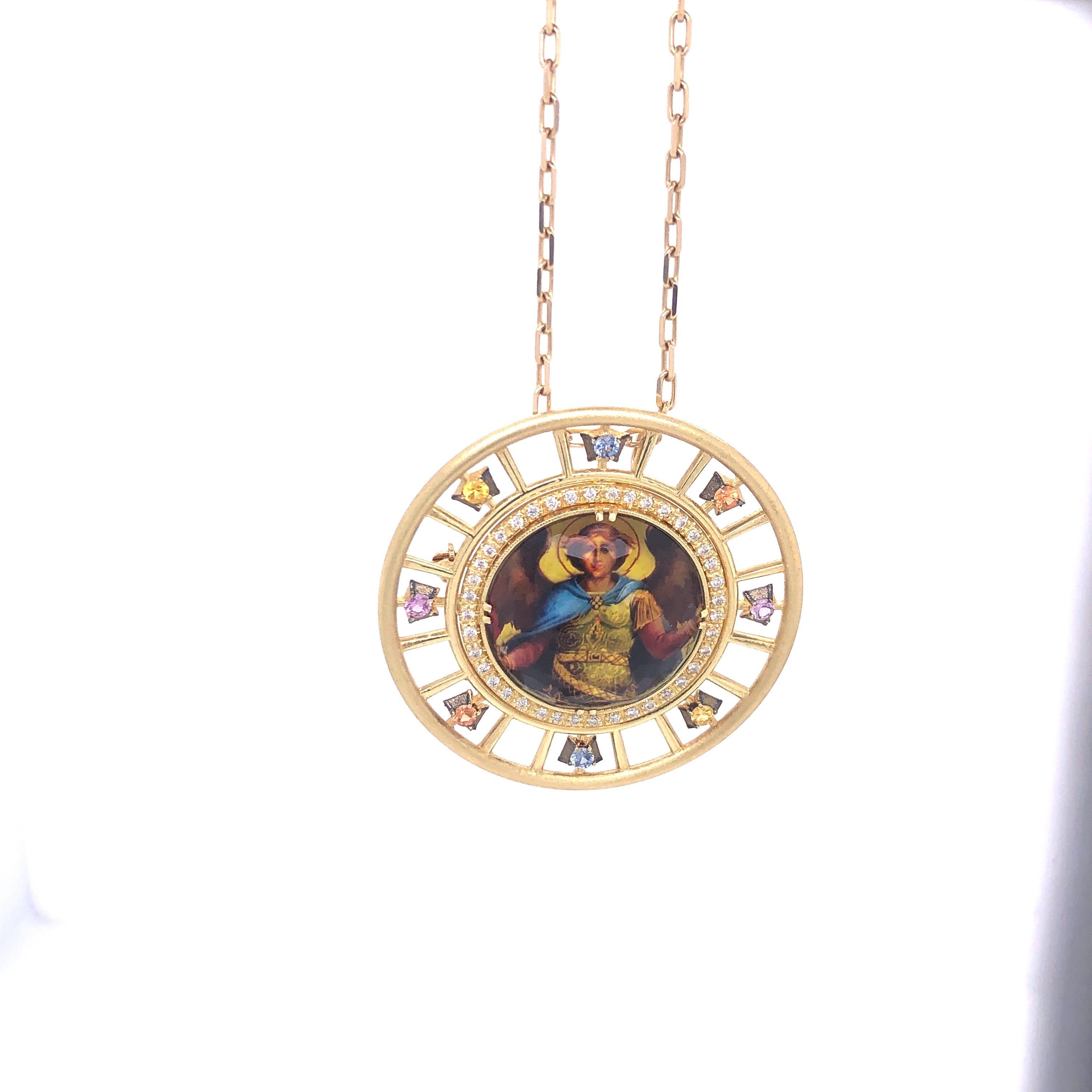 From Award Winning Designer Melissa Spencer:  Angel St. Michael  Spencer Portrait  in 18K Yellow Gold with 40 Diamonds (.40cts),  2 Yellow, 2 Orange, 2 Blue  and 2 Pink Sapphires (.64cttw).  Paperclip Chain not included.  
This elegant setting