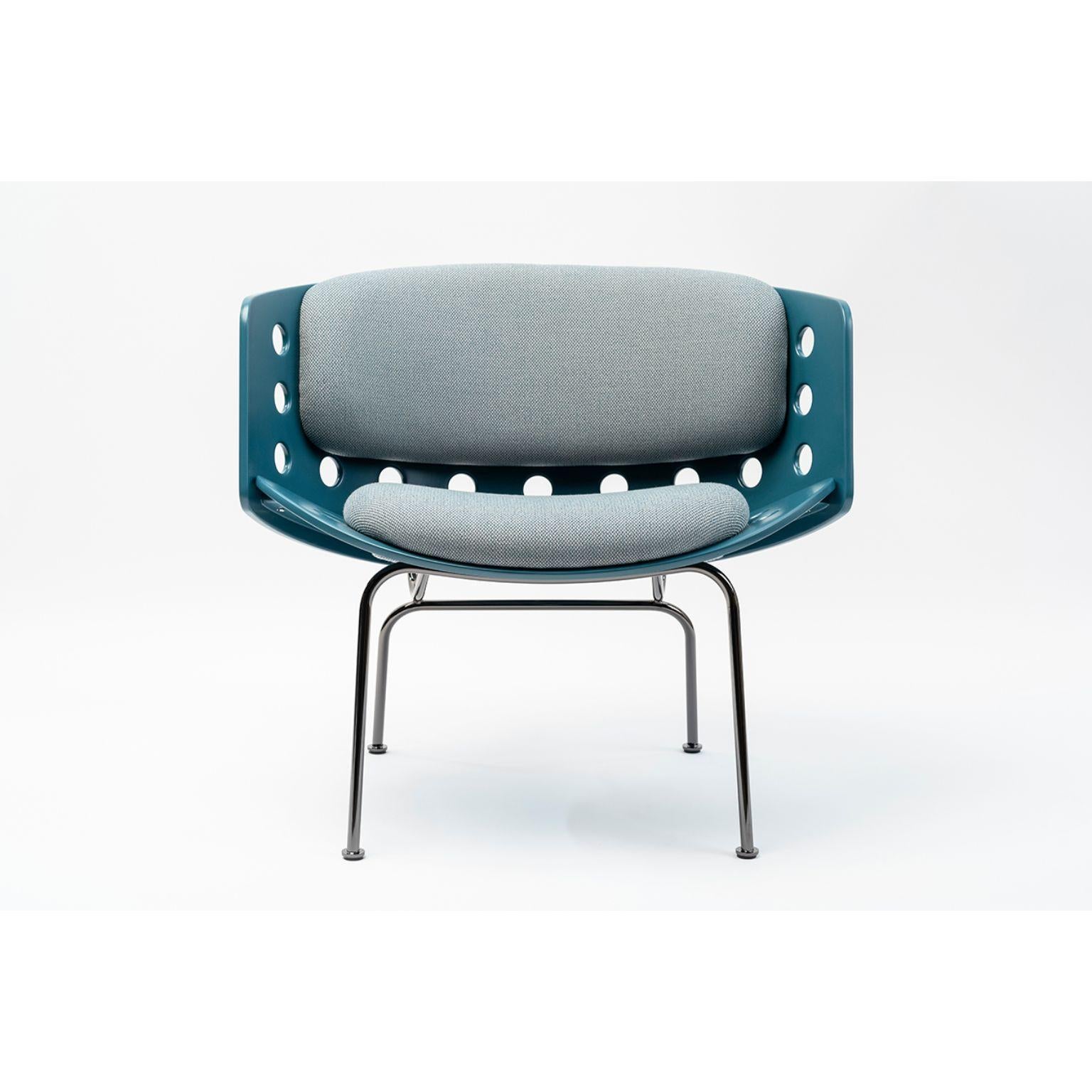 Melitea lounge chair by Luca Nichetto
Materials: Shell: Dark Green NCS 8010 B70G/Dark Yellow NCS 4050 Y20R/Duck Blue
 NCS 6020 B10G/Warm Light Grey NCS 2002 Y50R lacquered Polyurethane
 Upholstery: Fabric or Leather
 Structure: Black