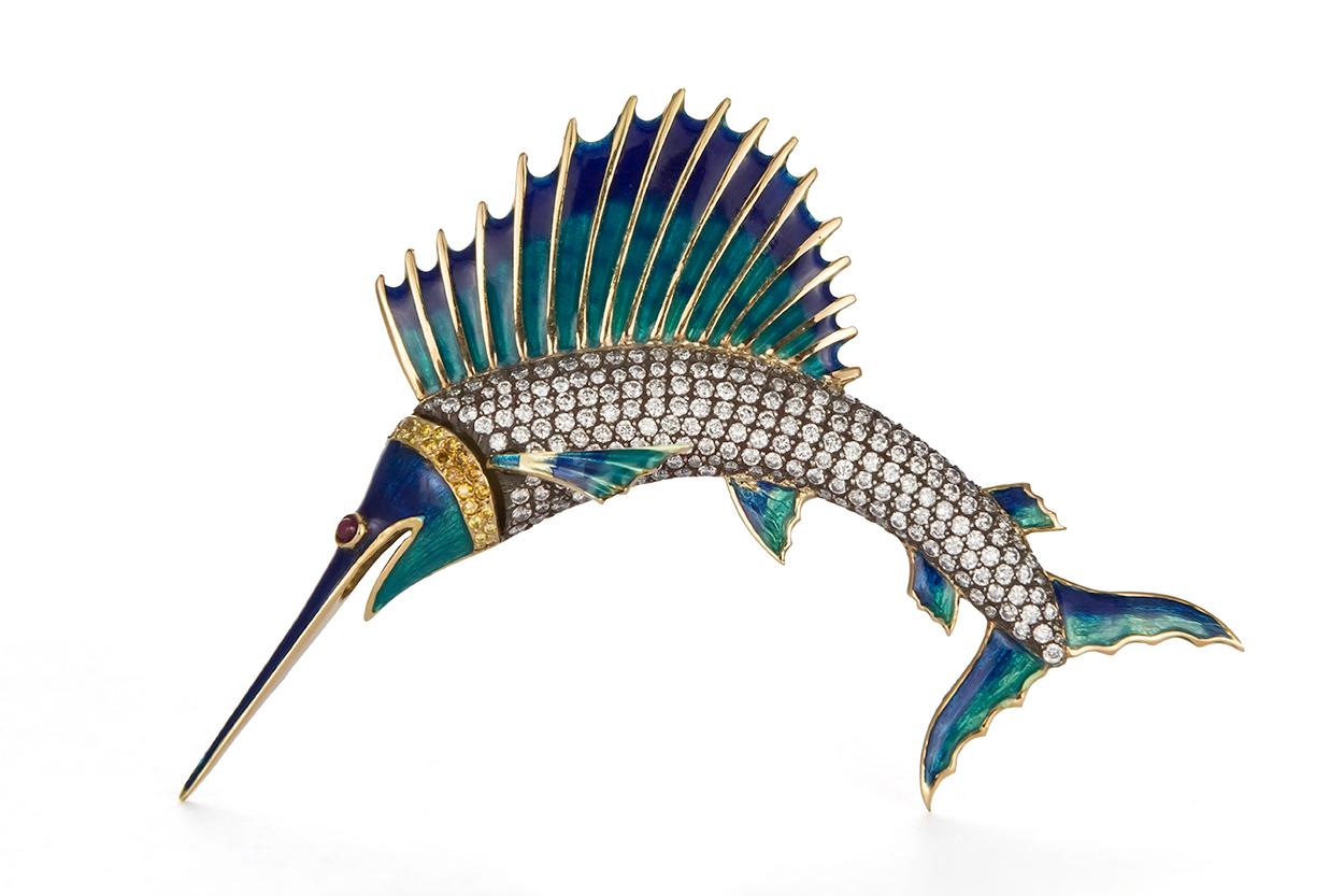 We are pleased to offer this Melkon Design 18k Yellow Gold, Silver & Diamond Sailfish Brooch Pin. This stunning brooch features beautiful hand painted enamel, silver set diamonds and 18k yellow gold. The Brooch measures approximately 3