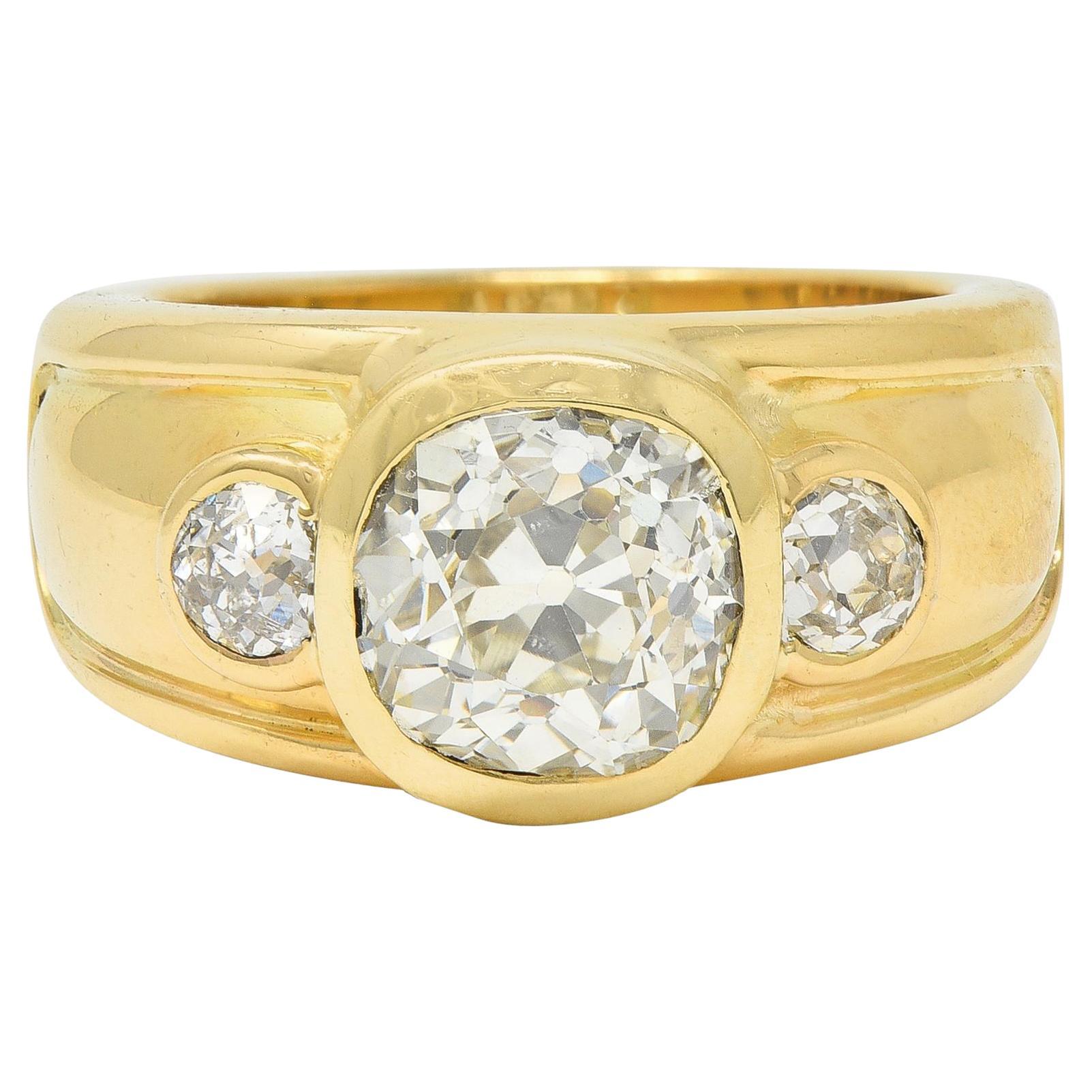 Mellerio 2.95 CTW Old Mine Cut Diamond 18 Karat Yellow Gold Three Stone Ring For Sale