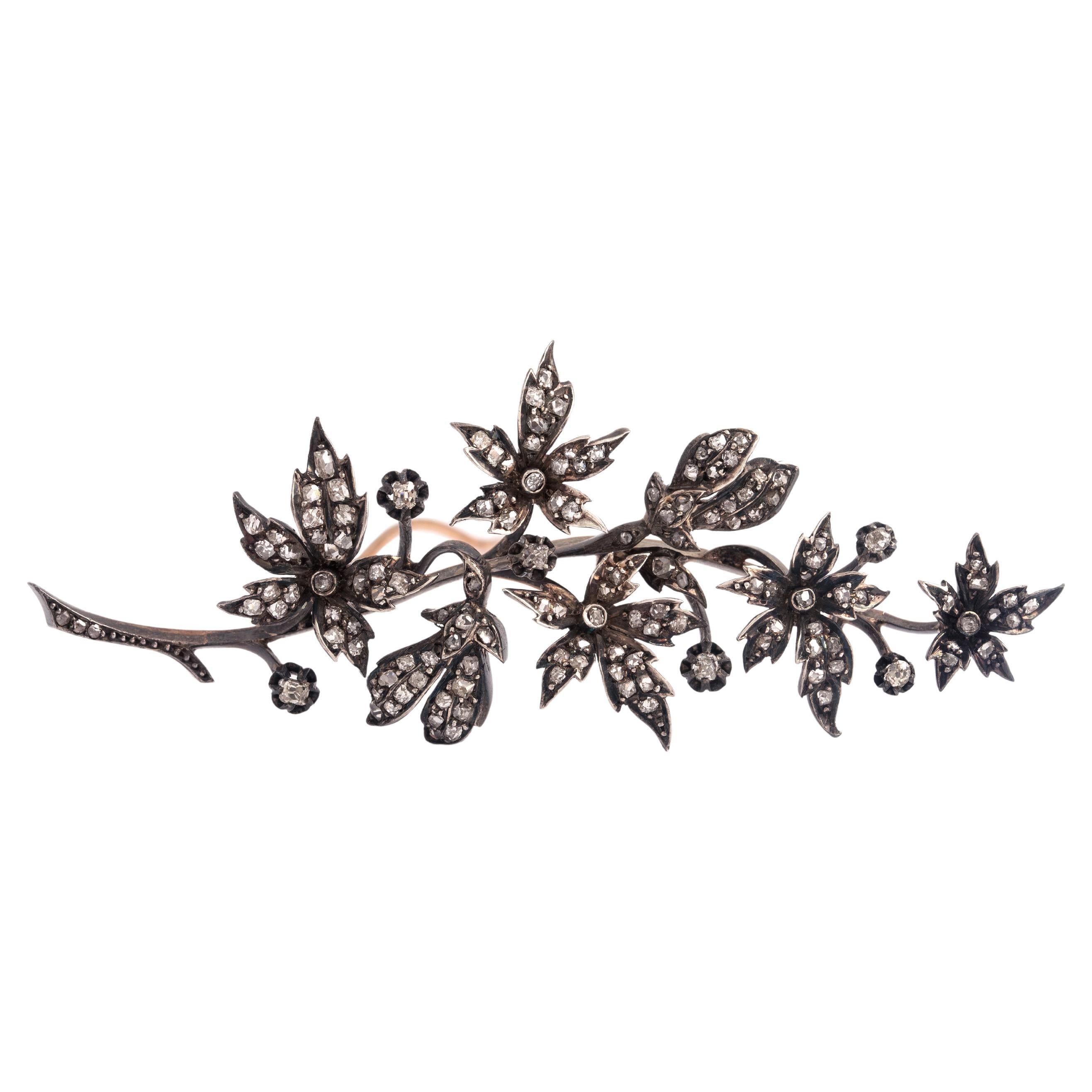 Antique Diamond Silver Gold Flower Brooch.
Late 19th Century. French marks.

Original antique box Mellerio Borgnis Paris - France.

Dimensions:
Length: 9.50 centimeters.
Height: 3.90 centimeters.
Thickness: 1.50 centimeters.

Weight: 22.51 grams.