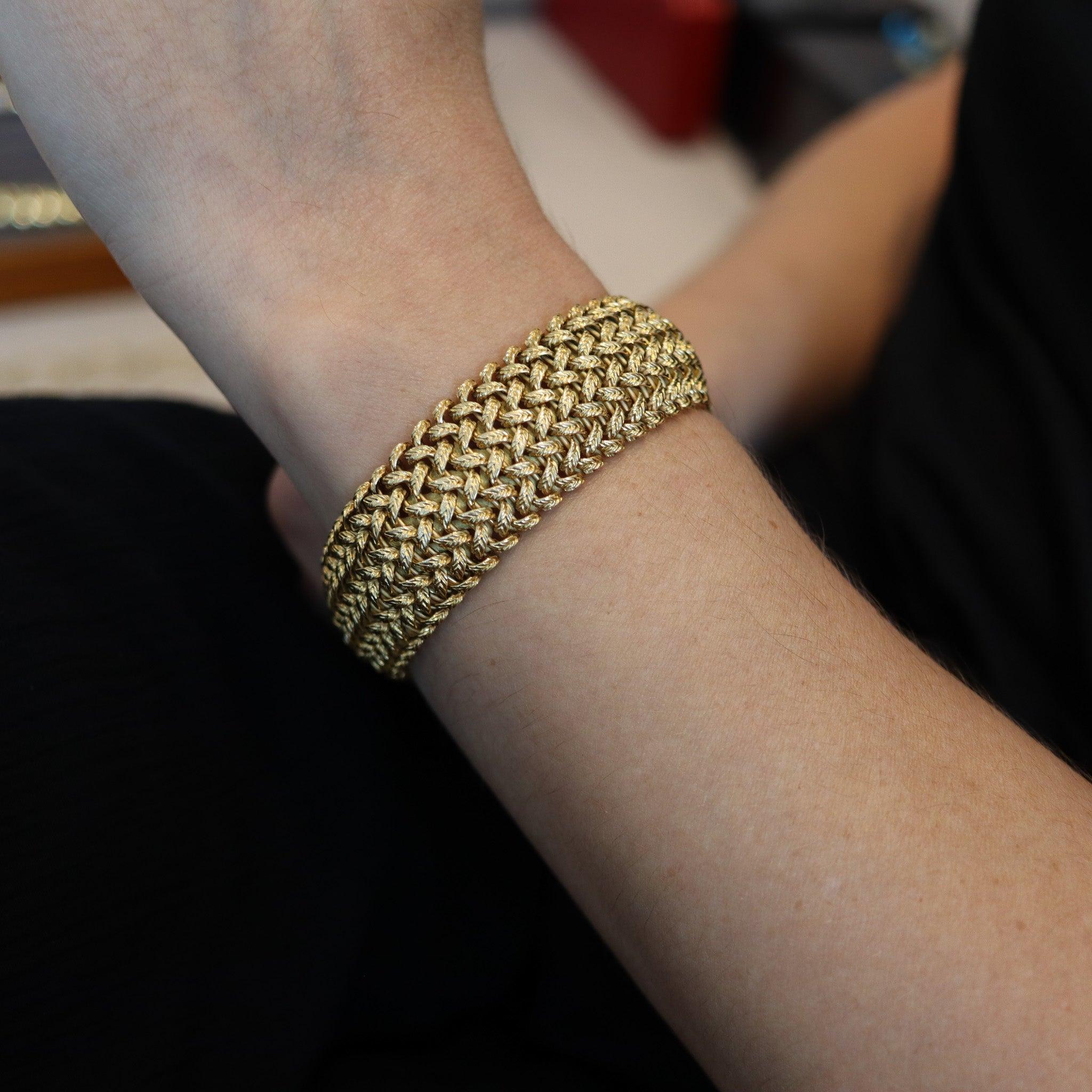 Mesh bracelet designed by Mellerio-Dits Meller.

This is a beautiful bold bracelet, created in Paris France by the jewelry house of Mellerio- Dits Meller, during the postwar period circa 1950. The bracelet is completely flexible with intricate mesh