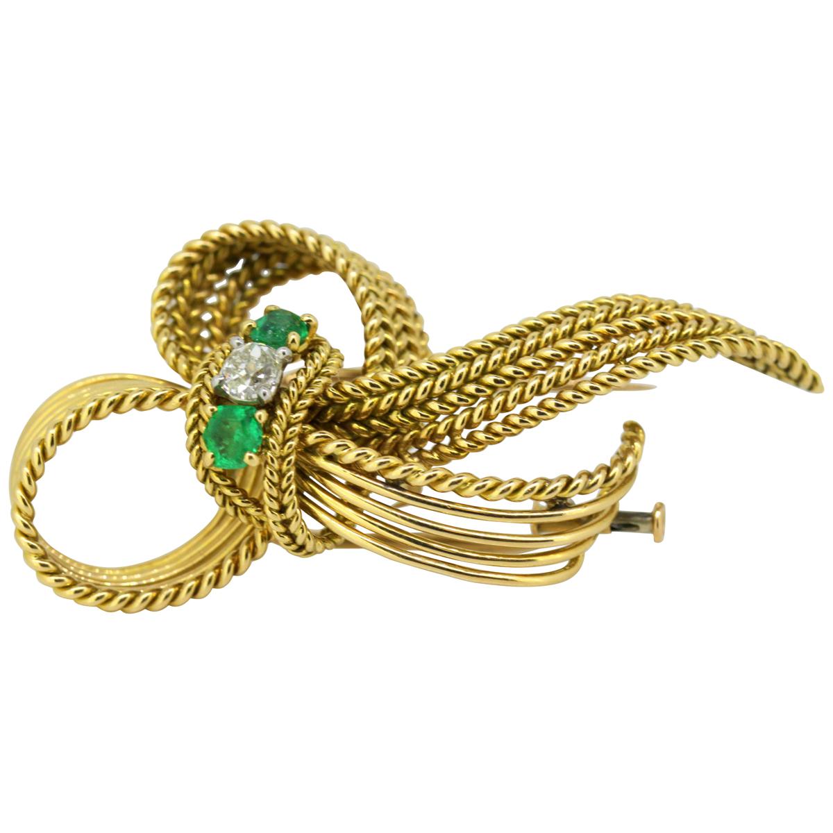Mellerio dits Meller, Art Deco 18 Karat Gold Brooch with Emeralds and Diamond