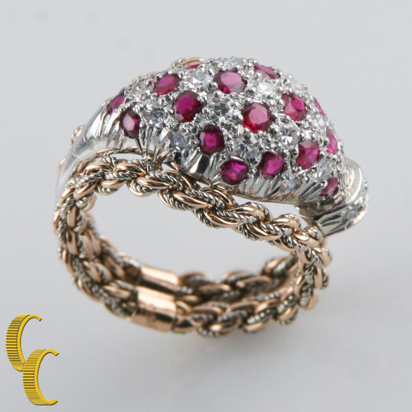 Amazing Bespoke Ring by Mellerio Dits Meller
Features 18k White Gold and Yellow Gold in Intricate Filigree Detailing
Includes Asymmetrical White Gold Domed Plaque with Alternating Diamonds and Rubies
Hallmarked 