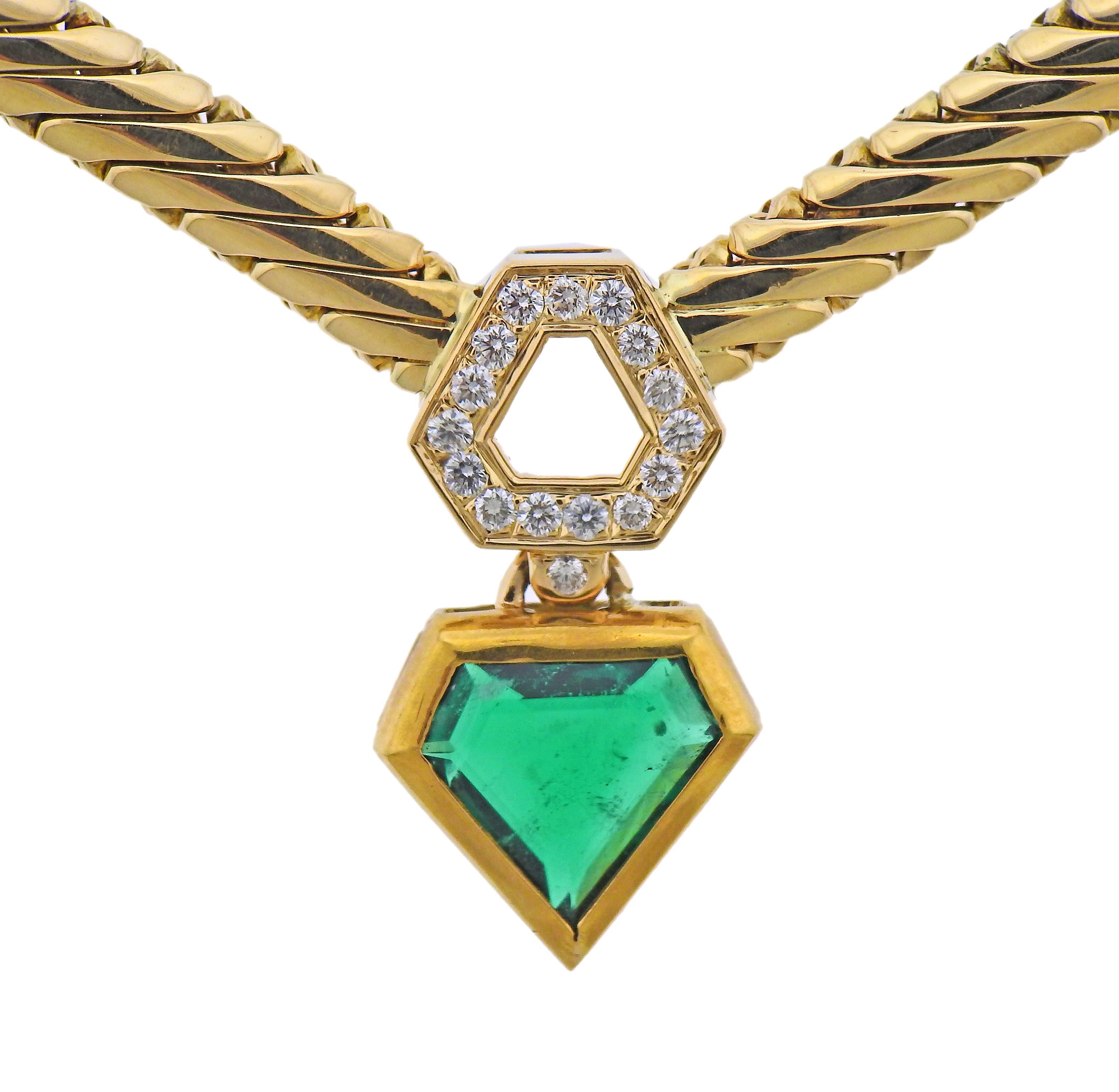 Italian made by Mellerio, 18k gold necklace with an emerald and diamond pendant. Necklace is 17