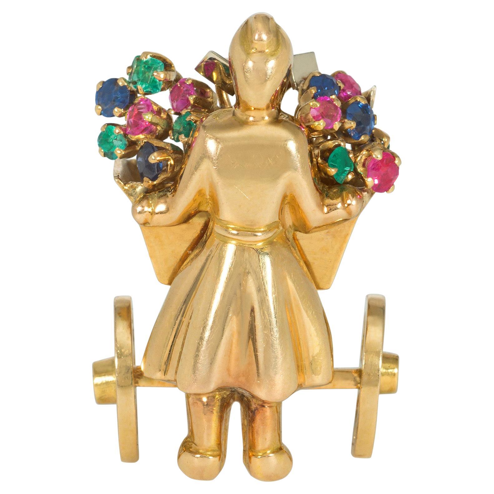 Mellerio Retro Gold and Multi-Gemstone Brooch of Figure with Flower Cart For Sale
