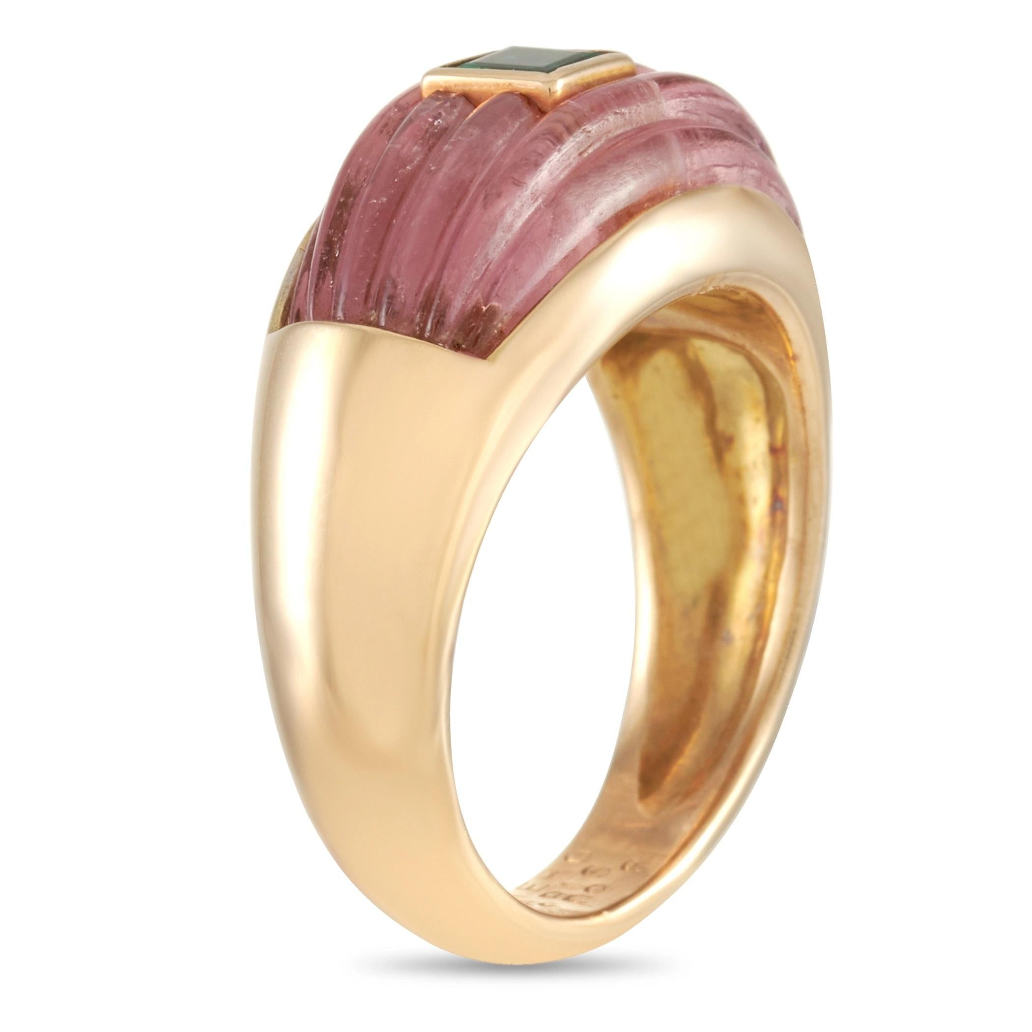 This Mellero ring is made of 18K yellow gold and set with a tourmaline and an emerald. The ring weighs 12.7 grams and boasts band thickness of 5 mm and top height of 6 mm, while top dimensions measure 10 by 19 mm.
 
 Offered in estate condition,