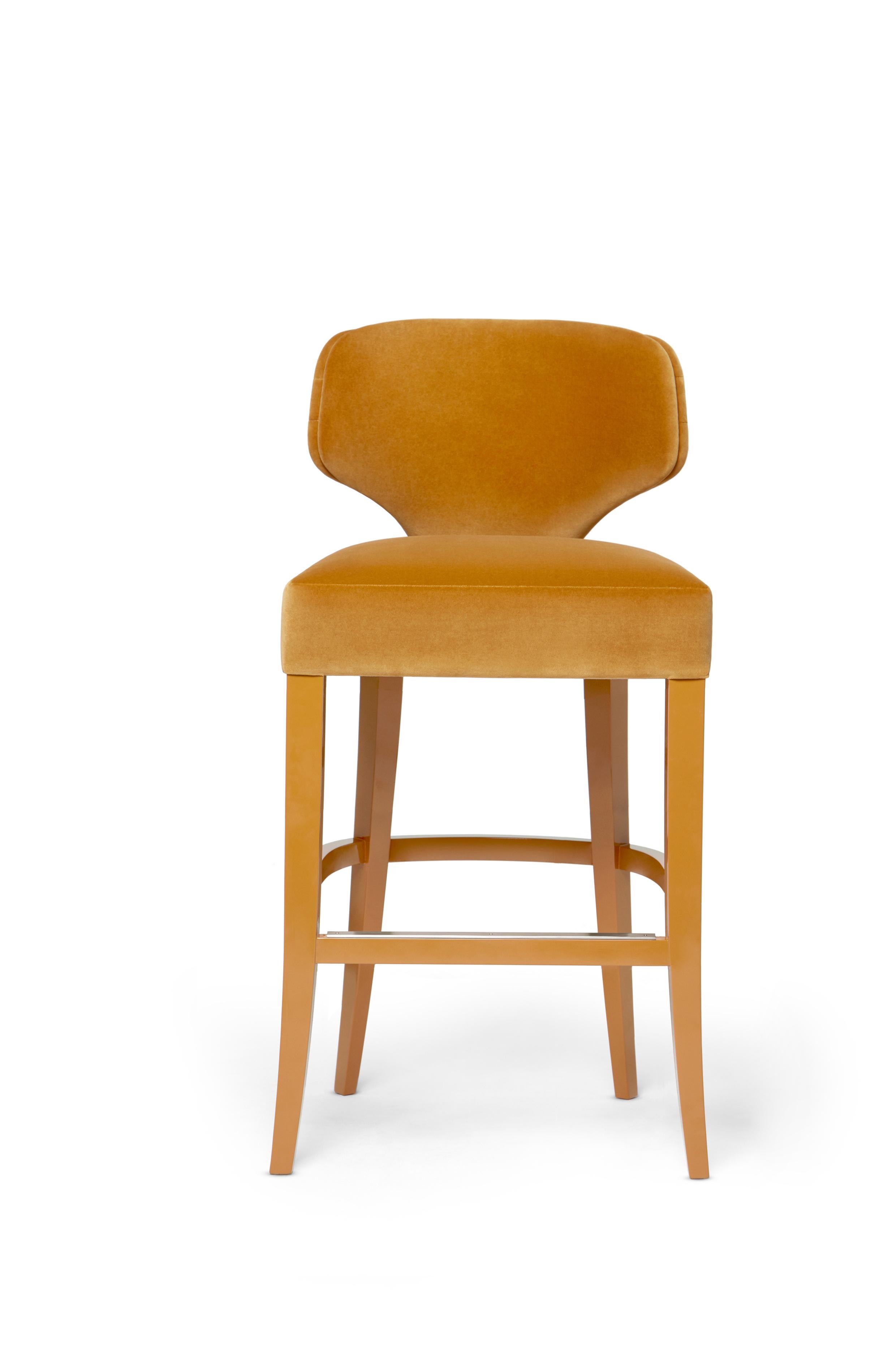 Melody Counter Stool by Munna
Dimensions: D 50 x W 50 x H 95 cm. SH: 70 cm.
Materials: Solid wood, foam, and upholstery.
Finish: Upholstery: Cotton Velvet, ref. Mustard, CV 10. Legs: Mustard Gloss Lacquer.

Available in all Munna fabrics except Wild