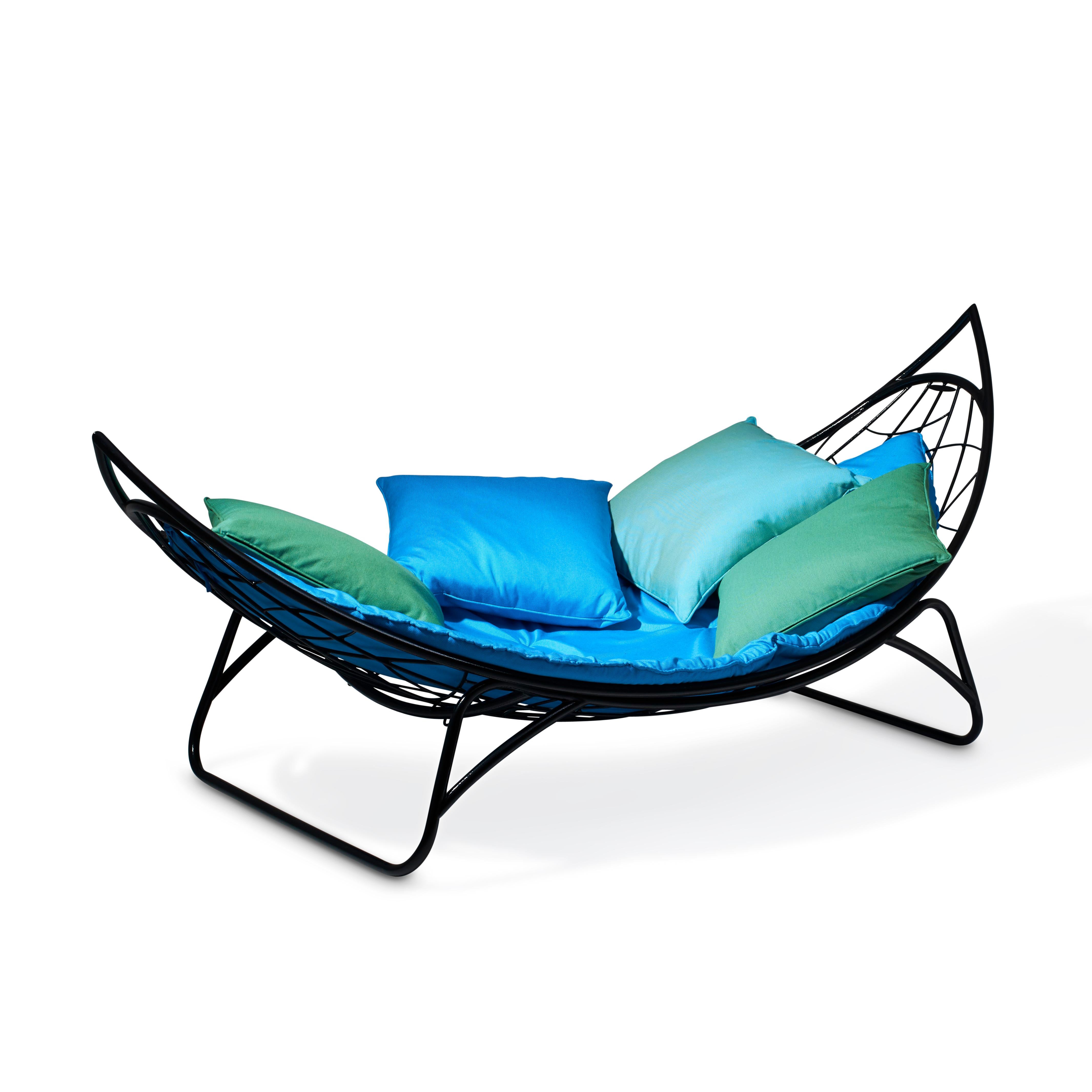 The Melon Lounger is inspired by a hammock - but with its structured hard frame it will not fold in and is thus hugely comfortable.
It’s organic shape is reminiscent of a slice of fruit like a melon.
It is spacious and comfortable with ample room