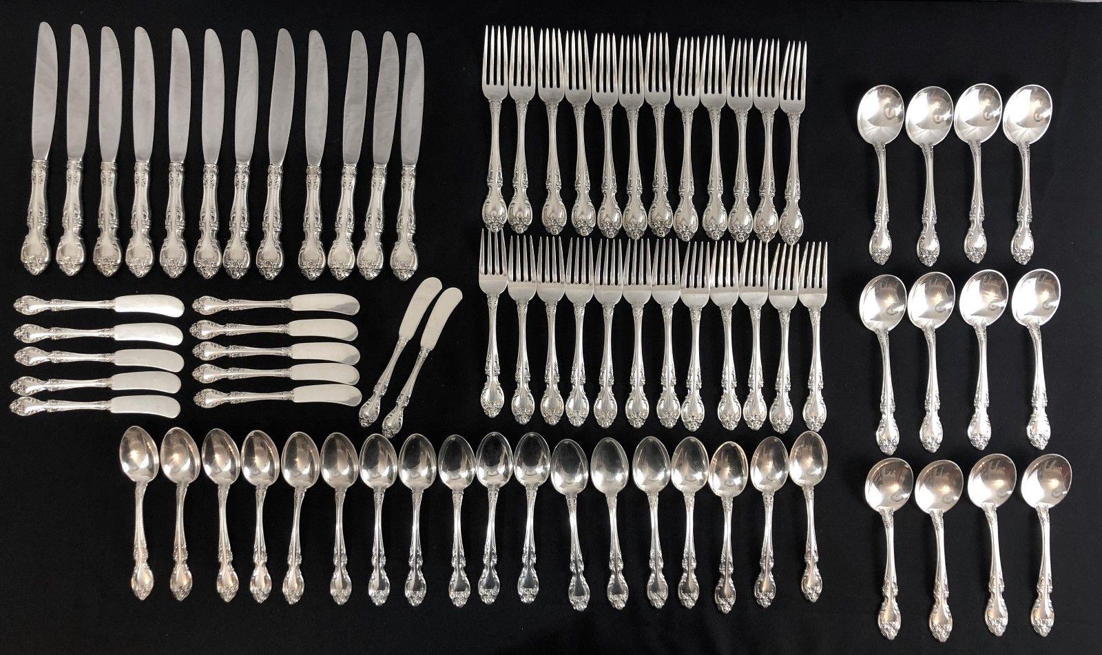 Gorham sterling silver flatware service for twelve in the Melrose pattern (1948). No Monograms.

12 dinner knives - 8 7/8