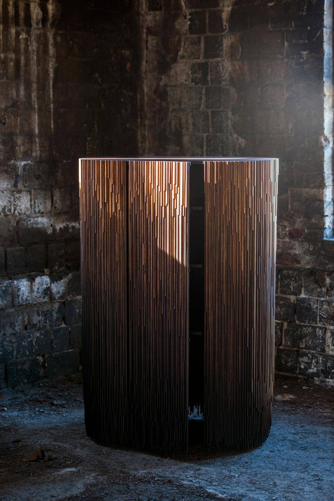 In the MELT cabinets industrially treated pine transforms into an unique art composition. The cabinet has been inspired by metamorphosis of the movement of water. By melting the ice again becomes liquid like rain.

Surface of the cabinets is built