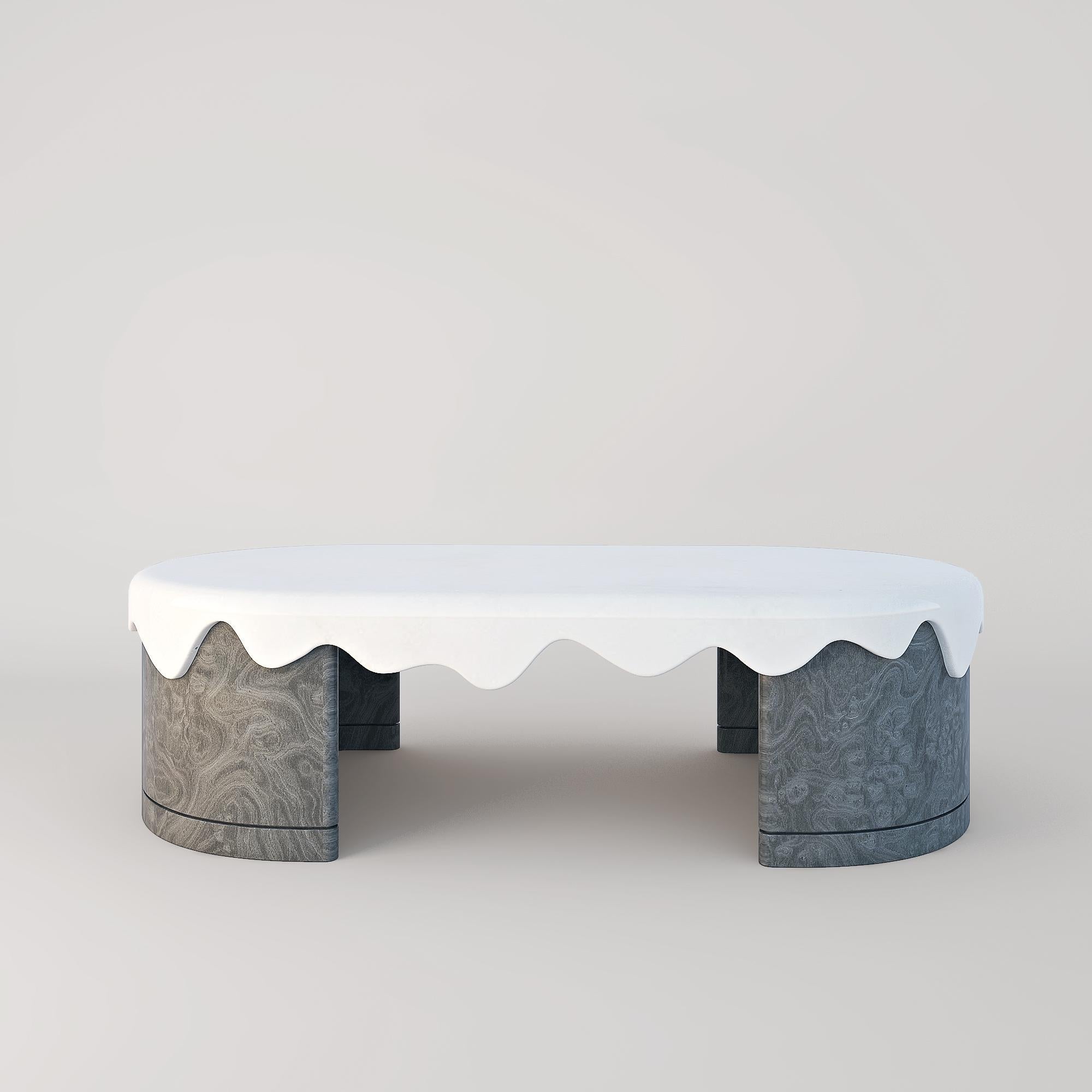 Blurring the lines between solidity and fluidity, the Melt collection leans on natural stones and wood to form a three-piece collection of tables while each piece plays with complementing and contrasting these materials in the name of achieving