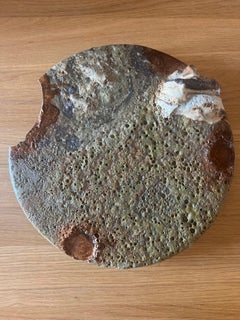 MELTING POT/ LAND,  a ceramic wall sculpture by Elena Pelosi