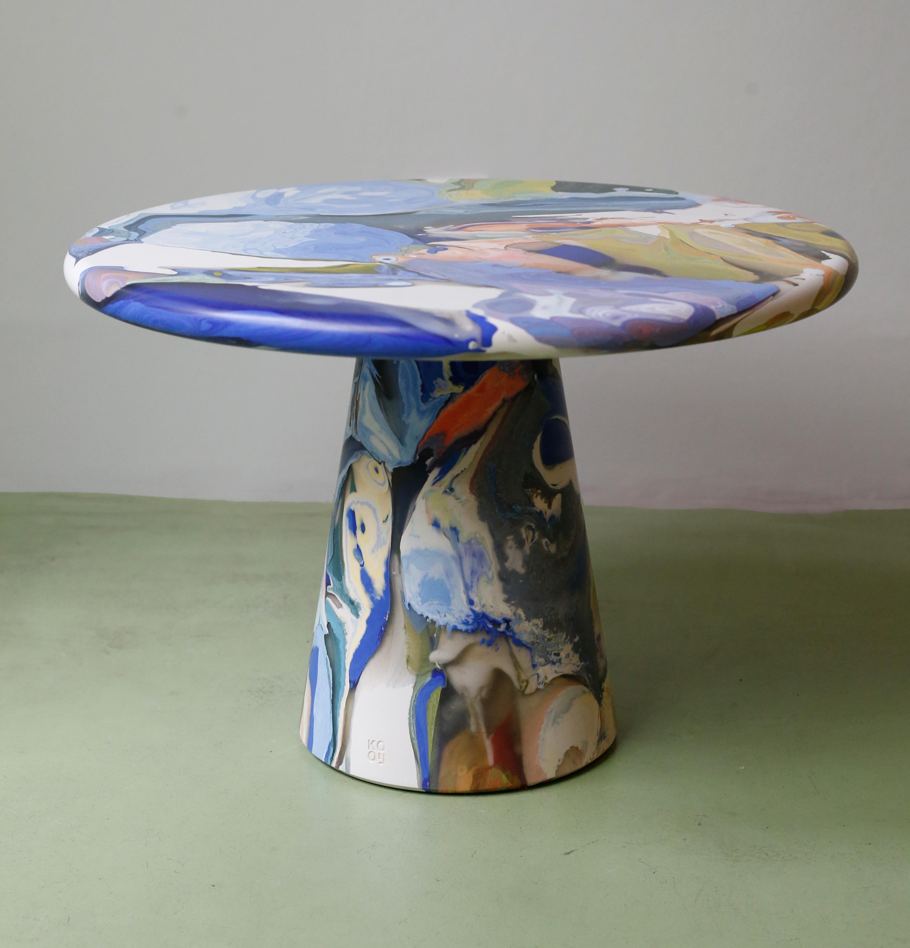 The Meltingpot table plays a keystone role in the circular design practice at Kooij. Discarded recycled plastic prototypes, production faults, and colour tests form the basis of the conglomerate Meltingpot. These multiform elements are curated and