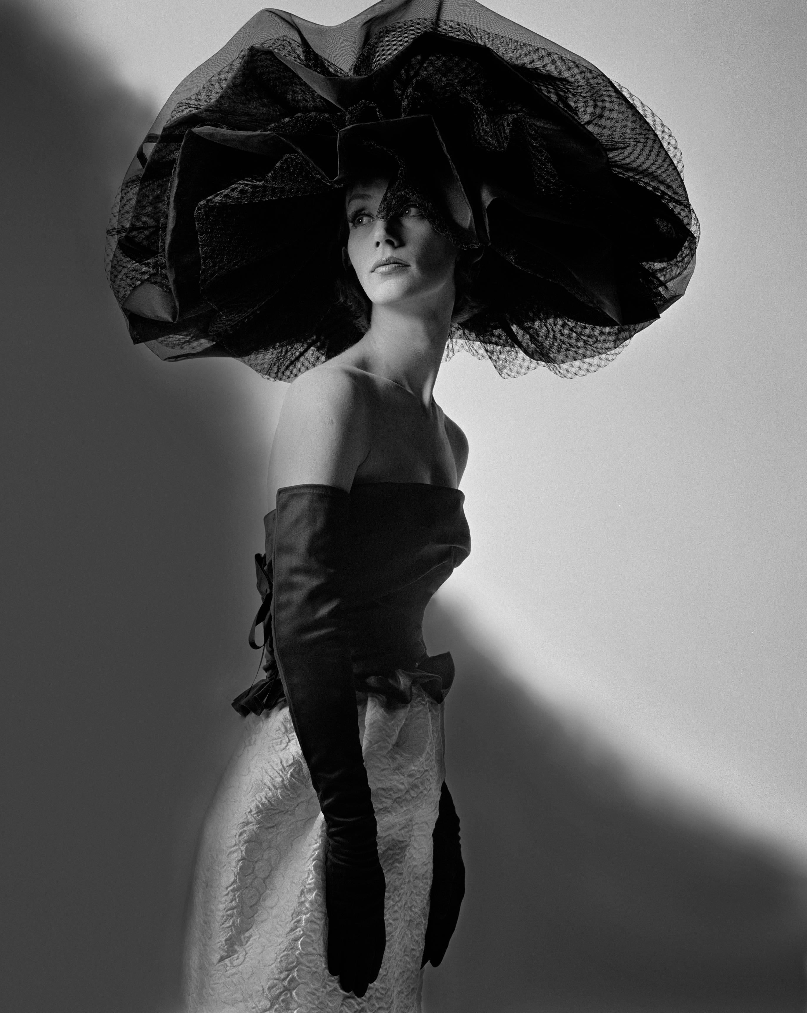 Melvin Sokolsky Black and White Photograph - Big Hat