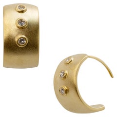 Orecchini Meme in oro con diamante, tondi da 1/2".