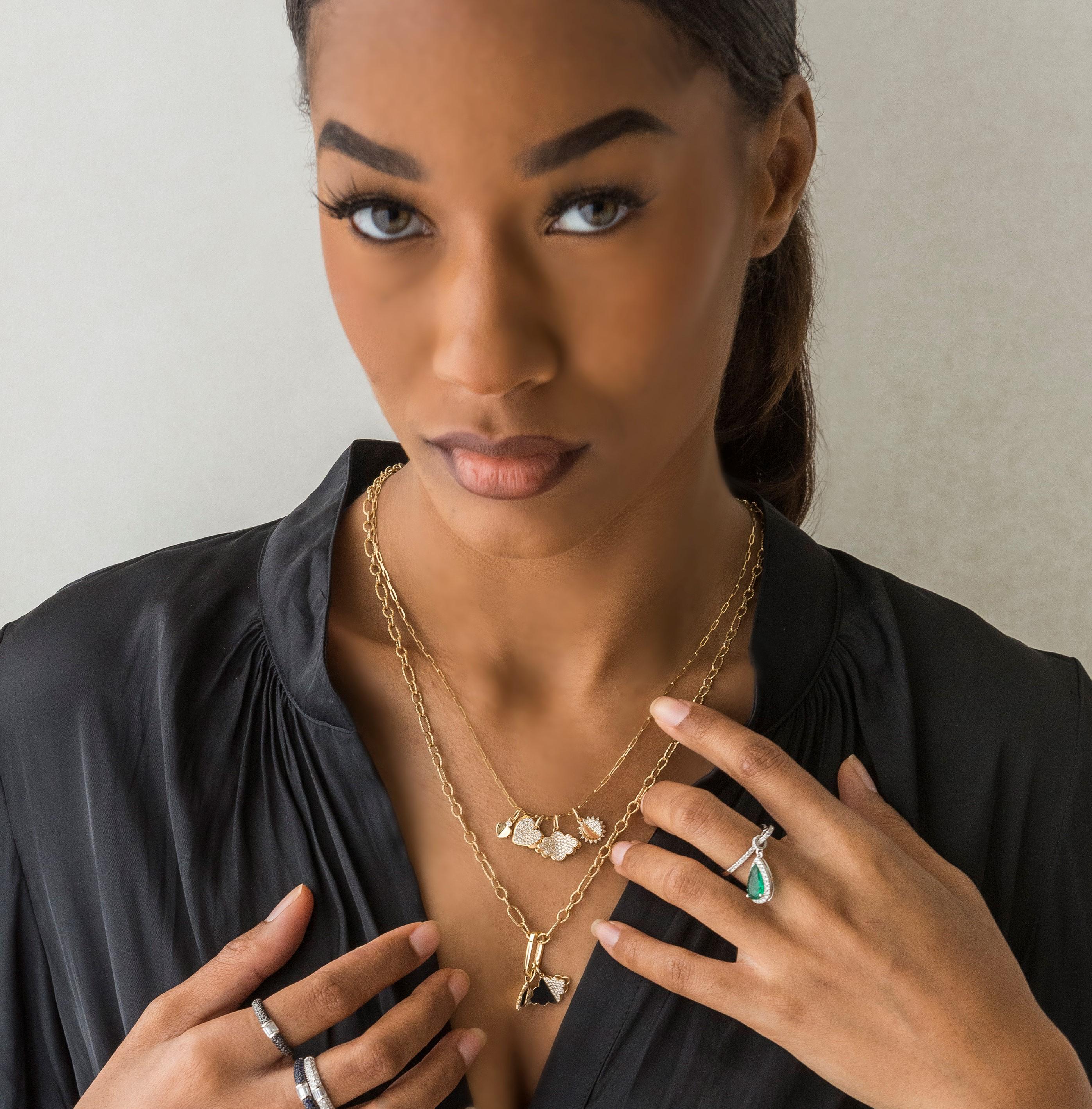 A collection symbolizing a special life moment or a new chapter in our life, the Memento collection is a luxurious and modern representation of classical motifs. This collection features diamond encrusted pieces set in 14k gold, and includes