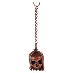 Memento mori. A caged and suspended skull sculpture, Germany, late 17th century.