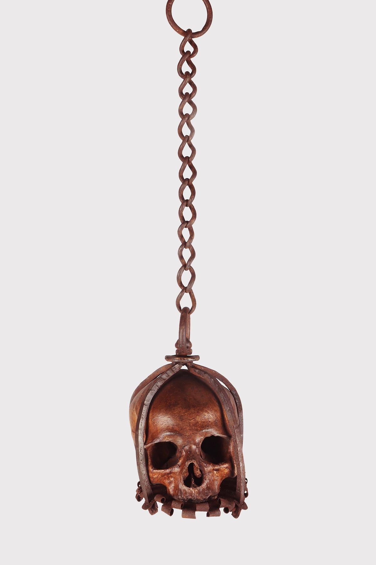 Memento mori. A caged and suspended skull sculpture, Germany, late 17th century. In Good Condition For Sale In Milan, IT