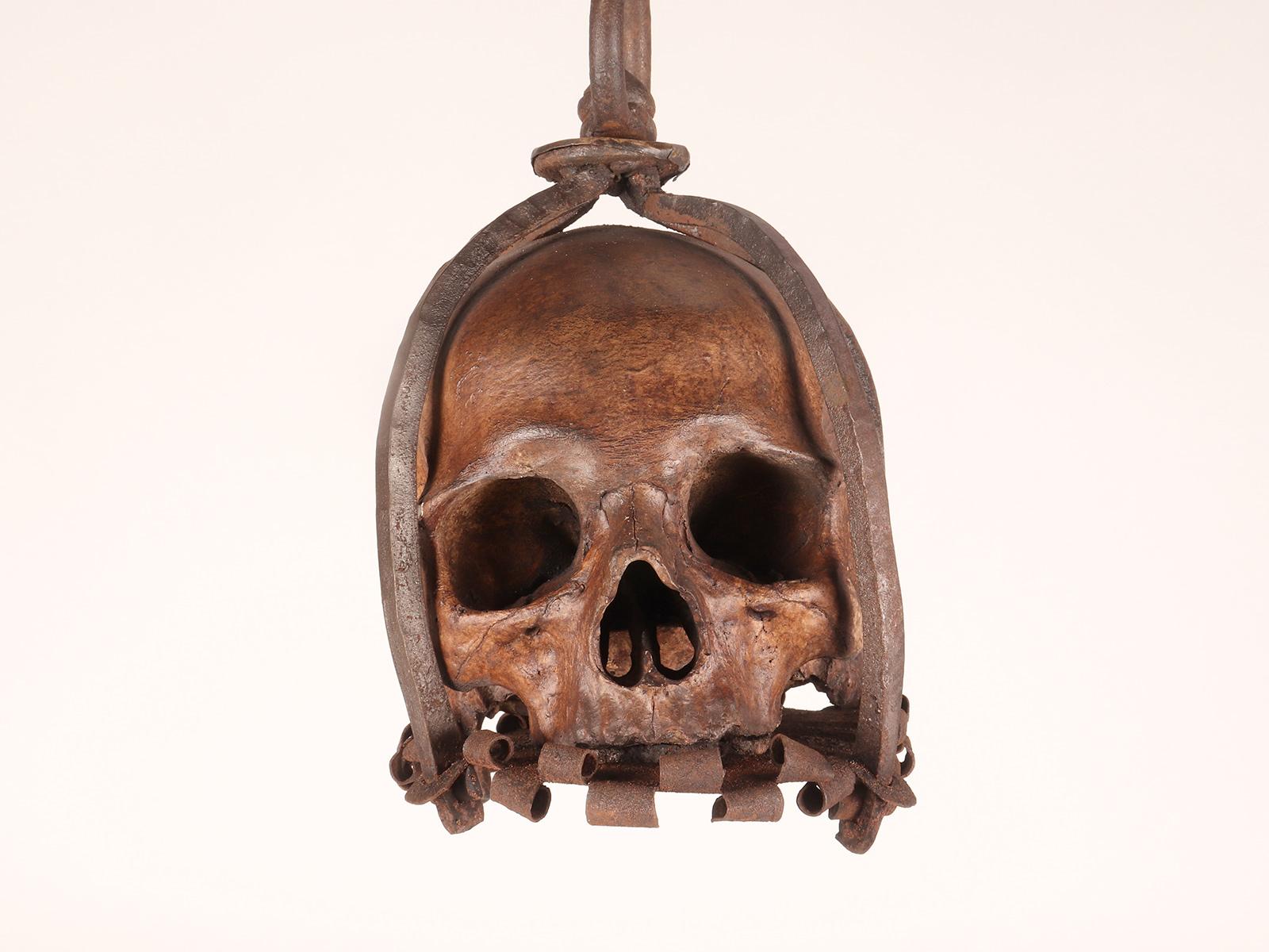 17th Century Memento mori. A caged and suspended skull sculpture, Germany, late 17th century.
