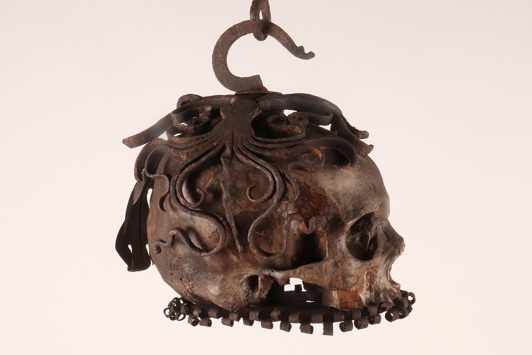 Memento mori. A caged and suspended skull sculpture, Germany, late 17th century. 2