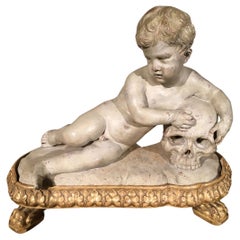 Sculpture de crâne d'enfant en faux marbre blanc Memento Mori, fin du 17ème siècle