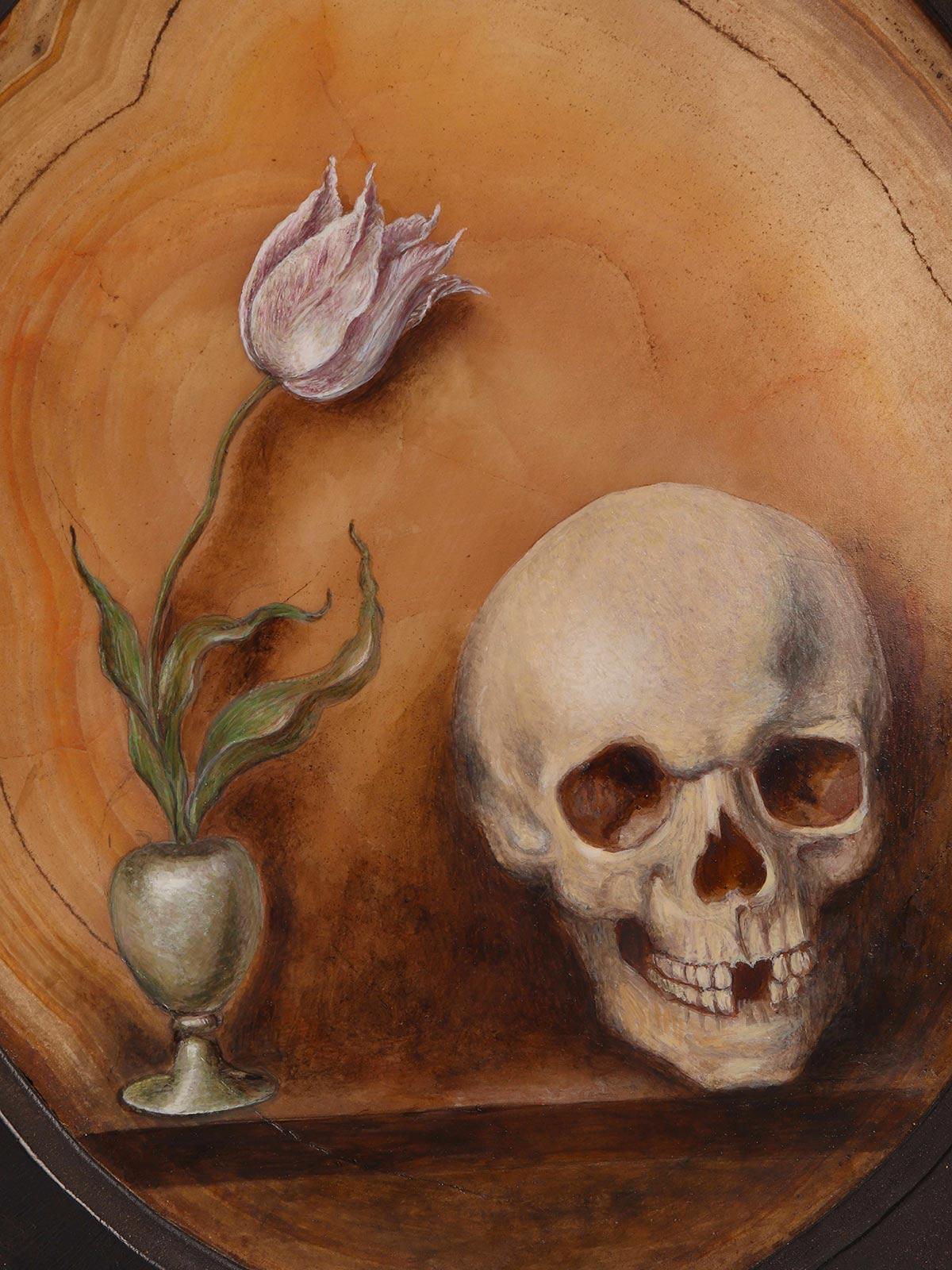 Memento Mori for Wunderkammer, depicting a skull and a tulip, oil paintings on hard stone. A large specimen of oval-shaped natural agate, with a black wooden frame, is mounted on a base of the same wood with an agate inlay. A bronze candleholder is