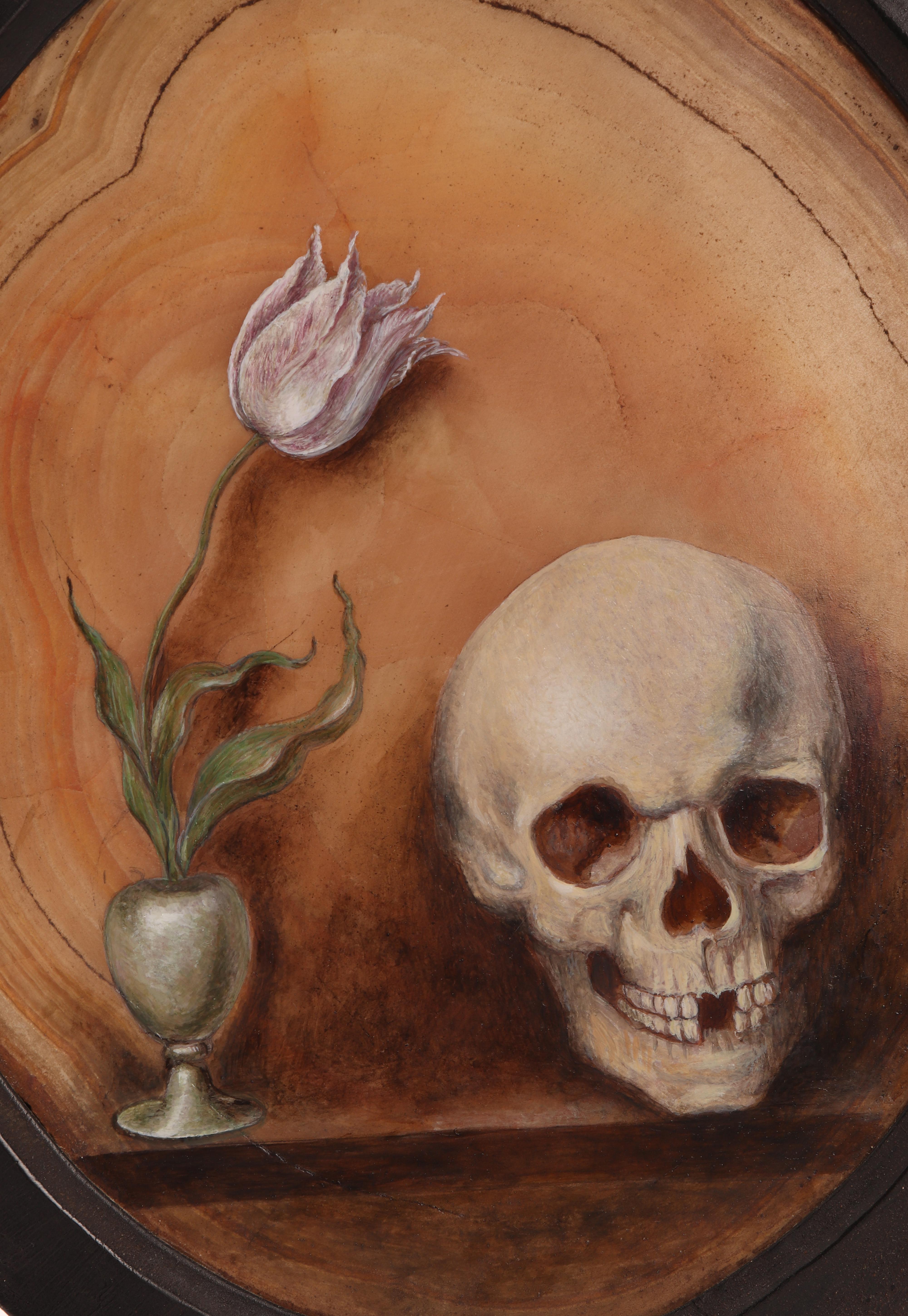 Memento Mori for Wunderkammer, depicting a skull and a tulip, oil paintings on hard stone. A large specimen of oval-shaped natural agate, with a black wooden frame, is mounted on a base of the same wood with an agate inlay. A bronze candle holder is