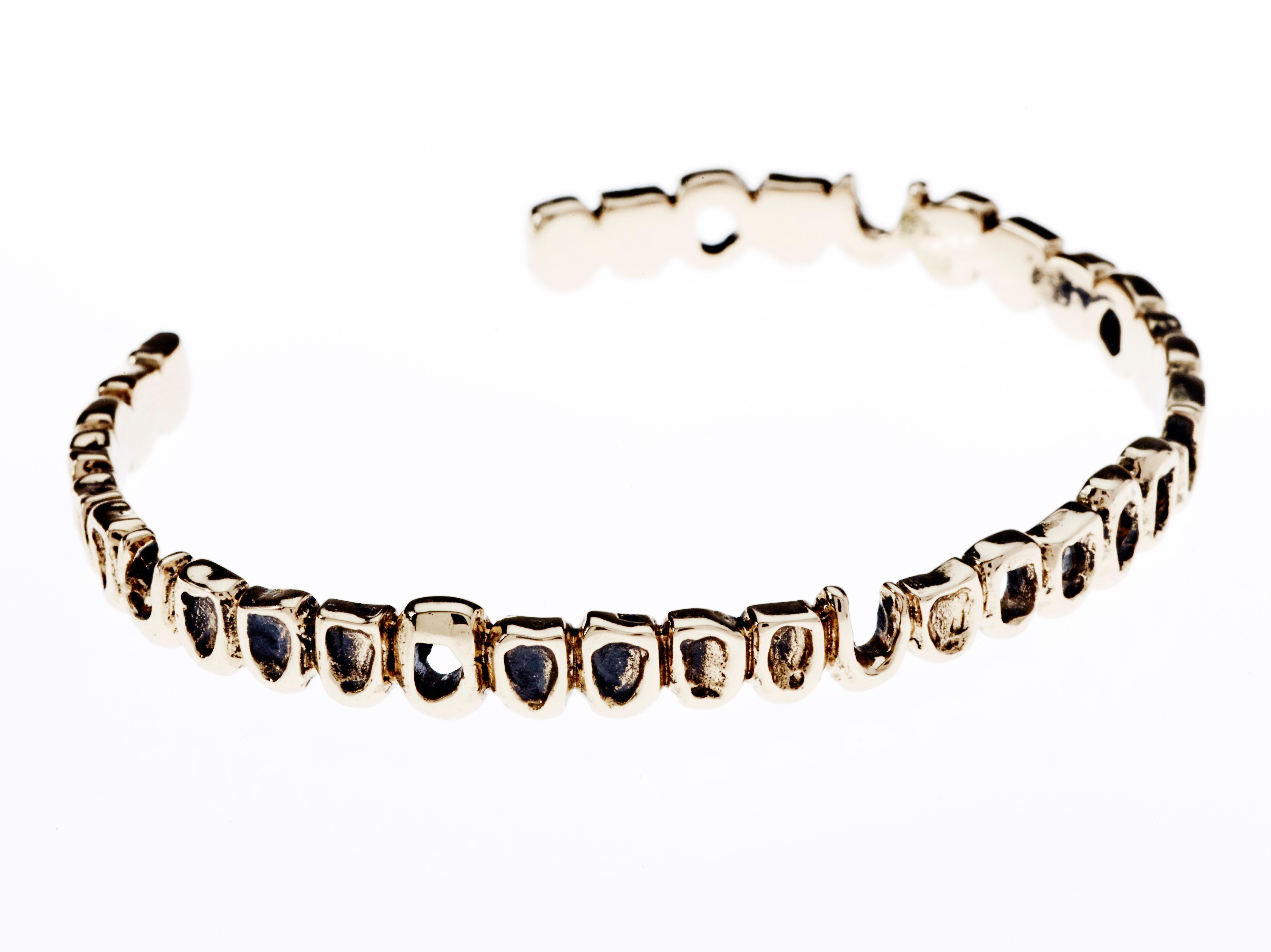 Memento Mori Style Cuff Bracelet Teeth 3 pcs White Diamond 

Designer: J Dauphin

Material: 14 k Gold plated 

Hand made in Los Angeles

This piece is made to order and will take 3-4 weeks to be completed.