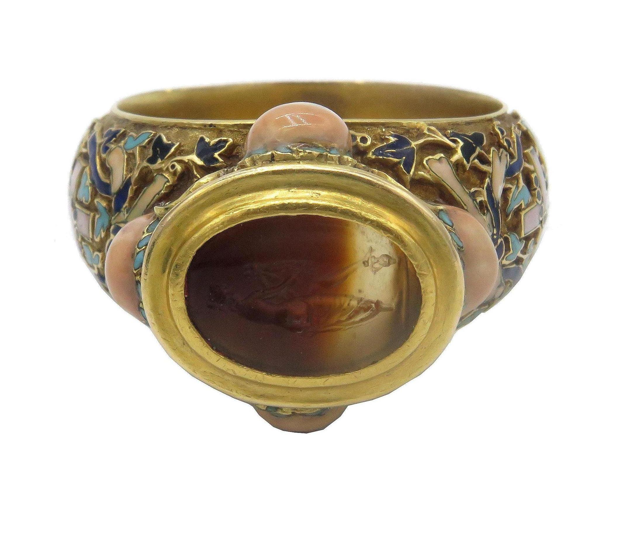 A 19th-Century gold ring that is the reinterpretation of a Memento Nori design by Gille Legare. The sides are enameled with death's heads and the hoop with cross, rosary and gravedigger's implements. The similarity between this ring and the Legare