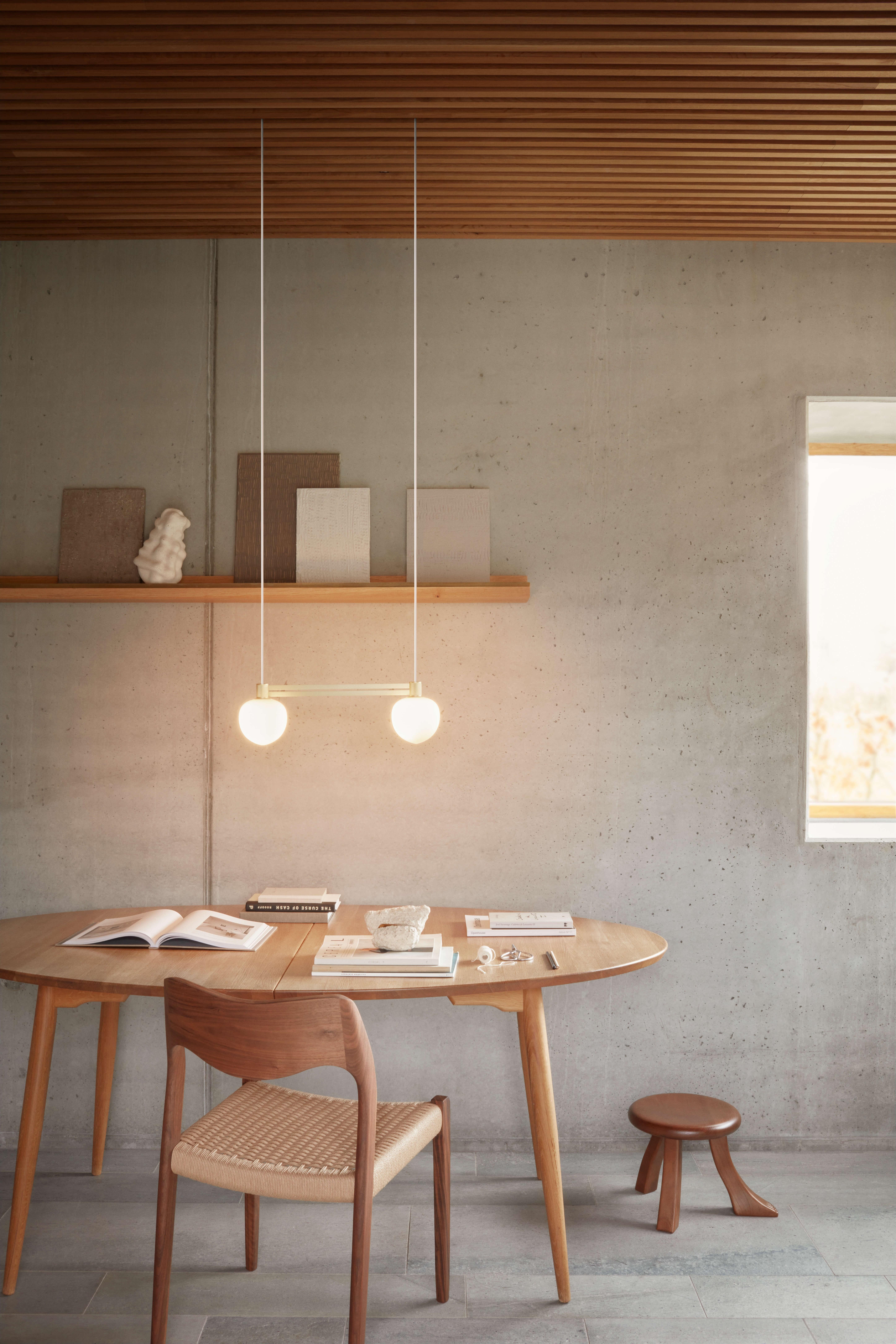 Memoir 120 Pendant Lamp signed by GamFratesi for LYFA.
Side by Side

DIMENSIONS
W 50.4 x D 12 x H 15.6 cm

COLOURS
Black or brass

Textile wire (white) 600cm
Socket: G9
Max wattage: 28 Watt
Energy class: The luminaire is compatible with bulbs of