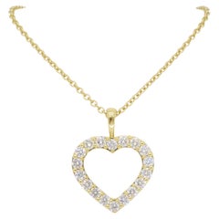 Mémoire Collier pendentif coeur en or jaune 18k avec diamants