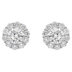 Clous d'oreilles en or blanc 18 carats de la collection Memoire Blossom avec diamants 0,22 carat