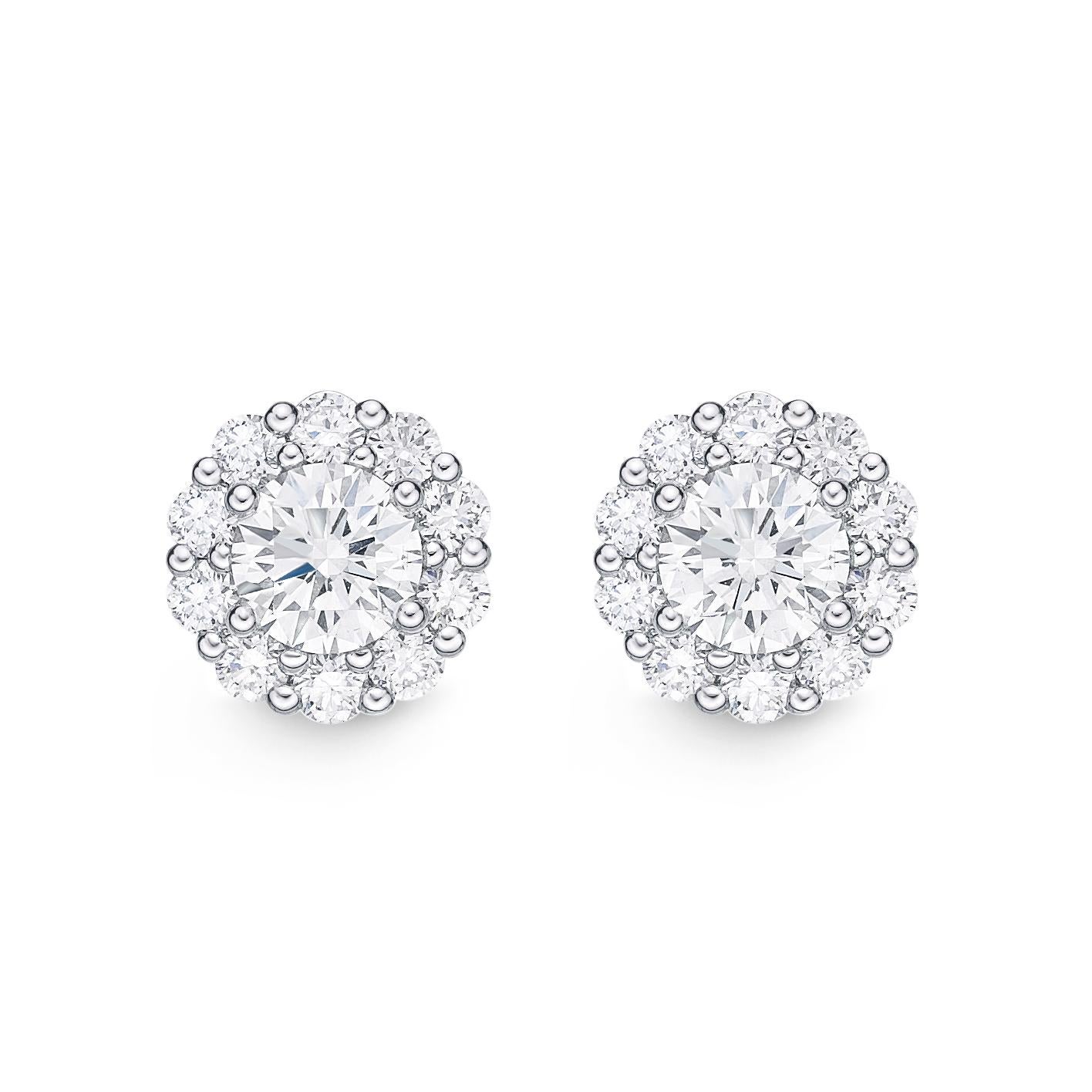 Memoire Blossom Collection Diamond Stud Earrings 0.97 ctw 18K White Gold

Additional Information:
22 Round Brilliant Cut  Diamonds equal to 0.97ctw.
Ideal Cut
G in Color SI 1 in Clarity
7.5 mm in Diameter