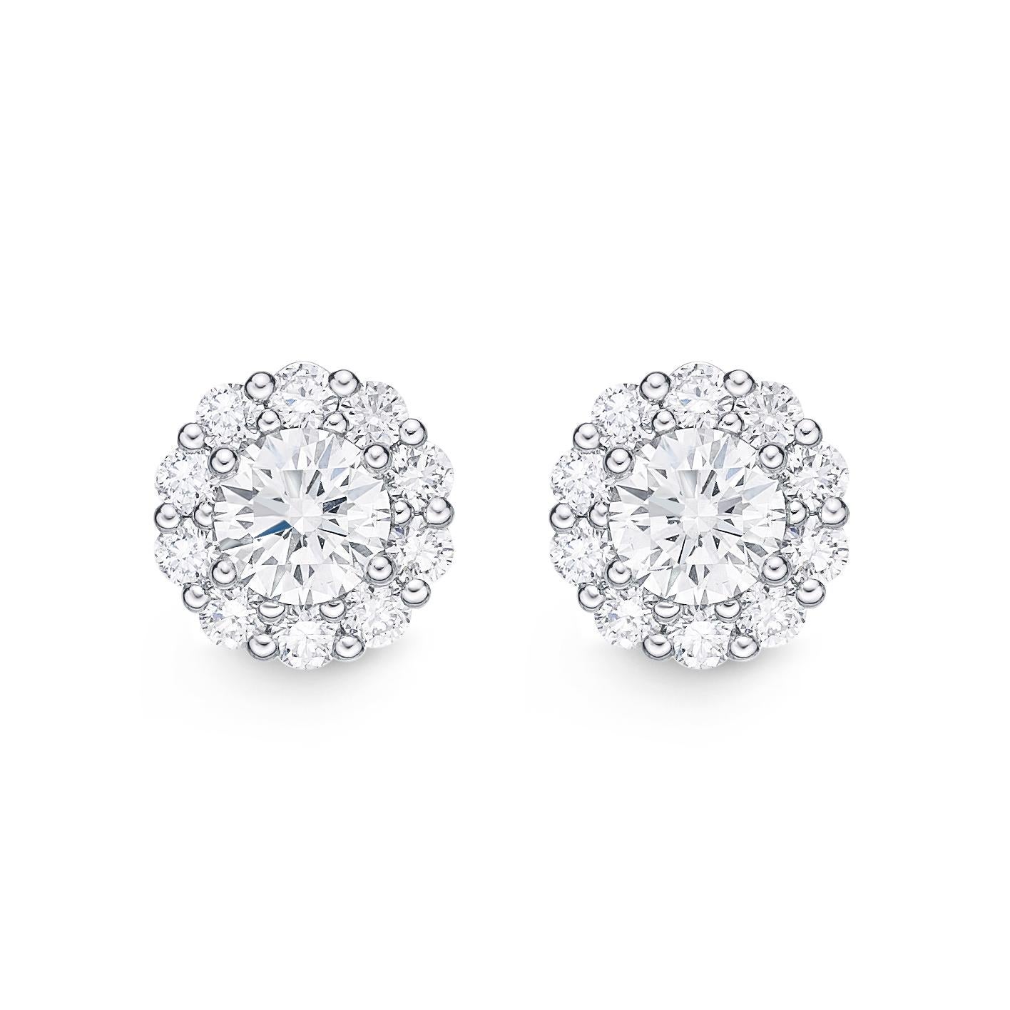 Memoire Blossom Collection Diamond Stud Earrings 0.97 ctw 18K White Gold

Additional Information:
22 Round Brilliant Cut  Diamonds equal to 0.97ctw.
Ideal Cut
G in Color SI 1 in Clarity
7.5 mm in Diameter