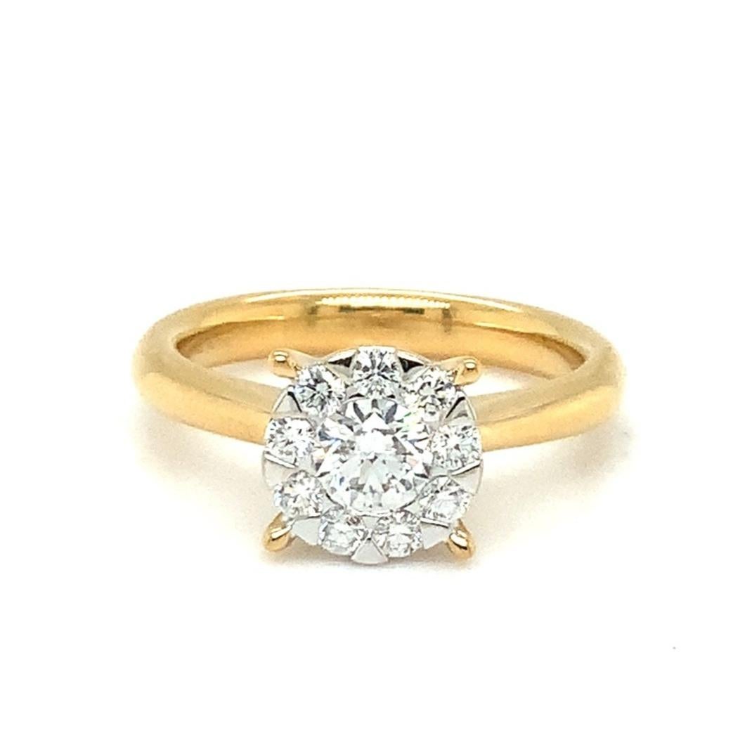  

Dieser Ring der Memoire Bouquet Collection'S ist aus 18-karätigem Gelbgold gefertigt und mit 10 runden Diamanten im Brillantschliff verziert, die zusammen 0,66 ctw an tatsächlichem Diamantgewicht ergeben. Dieses exquisite Design erweckt den
