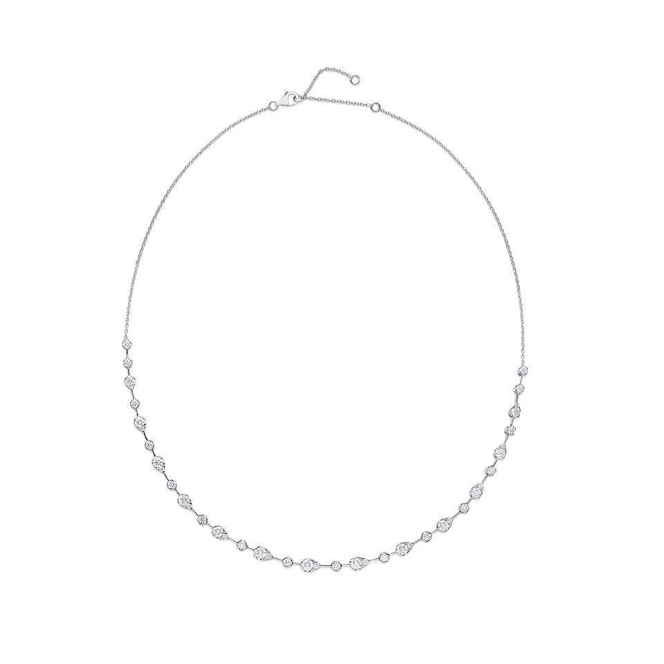 Memoire's classic design features forty-two diamonds with a total carat weight of 3.04 cts. The diamonds boast a brilliant cut and are graded G in color and VS in clarity. Crafted from 18K White Gold, the necklace is 18 inches in length with a
