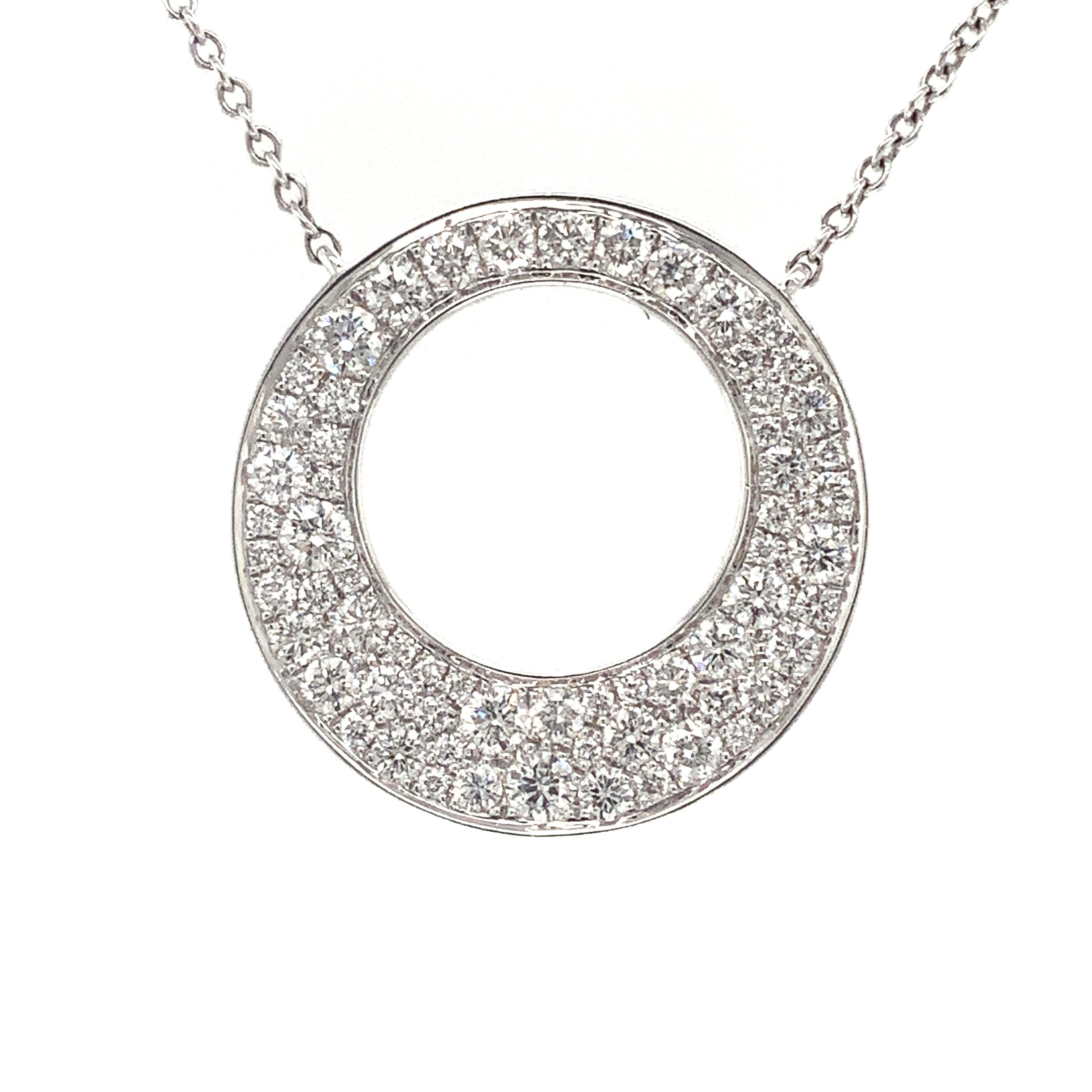 This Memoire Diamond Circle Pavé Pendant necklace features a total of 62 Round Brilliant Diamonds, amounting to 1.01ctw, set in an 18K White Gold 18