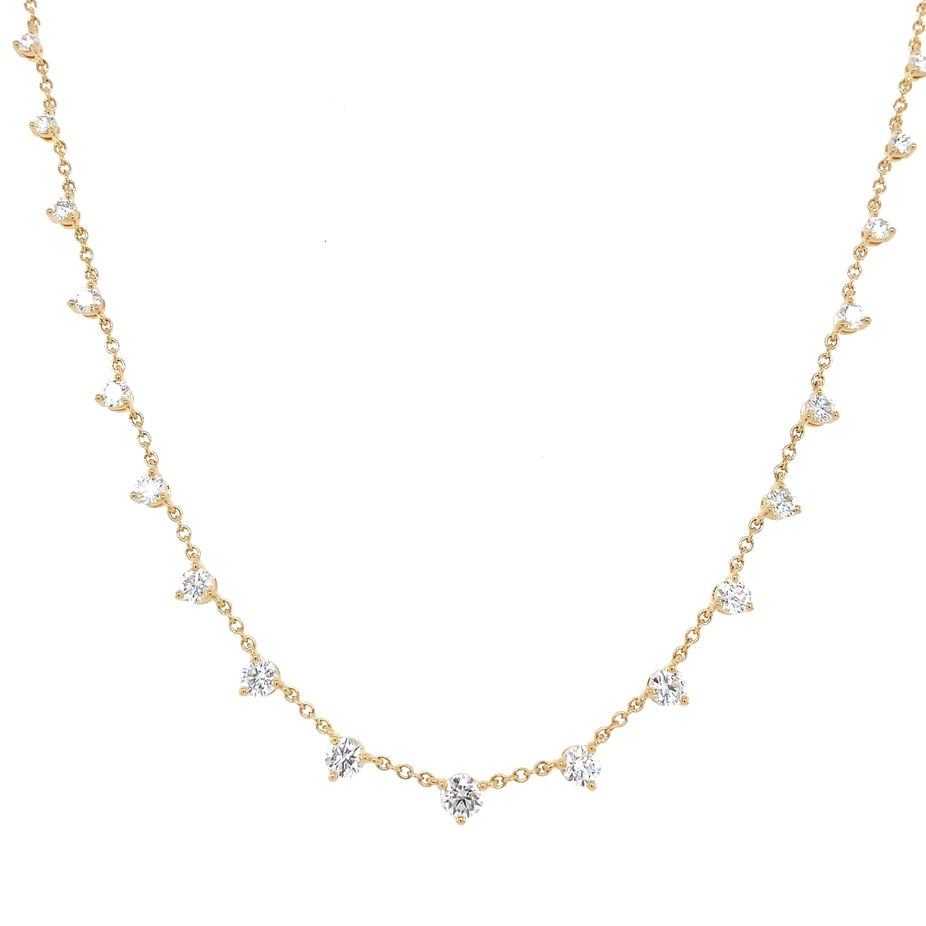 The Memoire Essential Collection 3 Prong Graduated Diamond Necklace set in 18K Yellow Gold features 21 Round Brilliant Cut Diamonds of 1.18ct. tw., boasting F-G Color and VS1 Clarity. It is 18