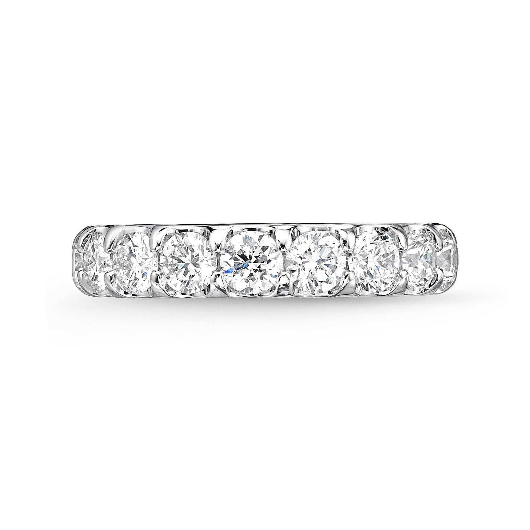 The Memoire Platinum Diamond Odessa Band is crafted with Platinum metal and is set with 9 Brilliant Round Diamonds accounting for 1.53ctw of F-G Color VS Clarity. Additionally, this piece is offered in Rose Gold, White Gold, and Yellow Gold and is a