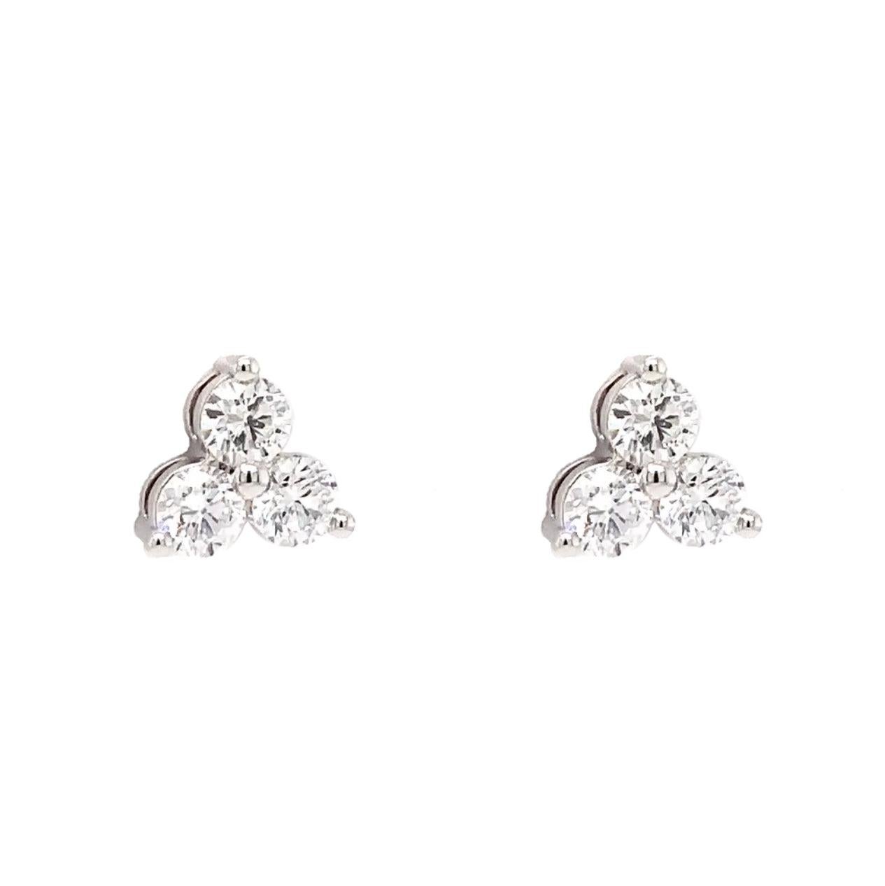 Memoire Trinity Collection 3 Stone Diamond Studs 0.91 ctw 18K White Gold

Additional Information:
Trinity Diamond Collection
6 Round Brilliant Diamonds equals 0.91 ctw
F Color
VS1 Clarity
This Earring measures 7.30 mm