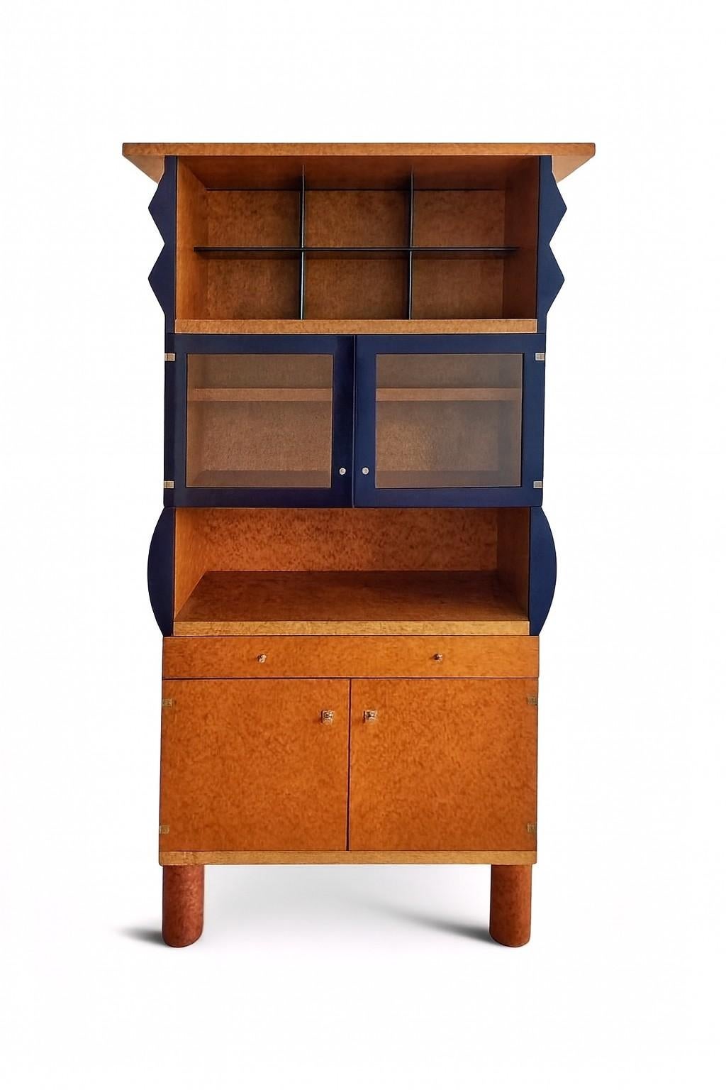 In this listing you will find an exceptionally rare Memphis style cabinet or a bookcase. It was designed by Ettore Sottsass and Marco Zanini for Franz Leitner as a part of Donau Collection. This multipurpose cabinet is extremely functional, apart