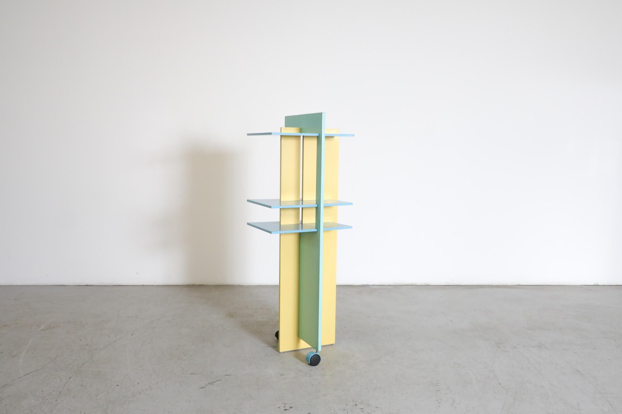 Italian Memphis Claudio Salocchi Inspired Blue & Yellow Revolving Bookcase For Sale