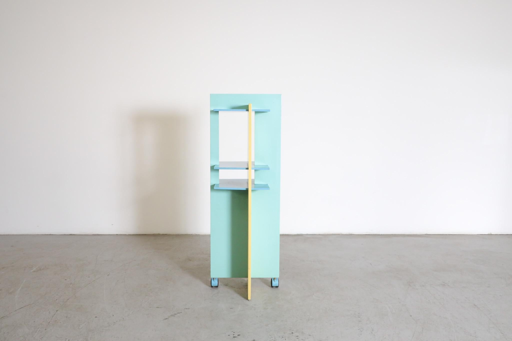 Memphis Claudio Salocchi Inspired Blue & Yellow Revolving Bookcase In Good Condition For Sale In Los Angeles, CA
