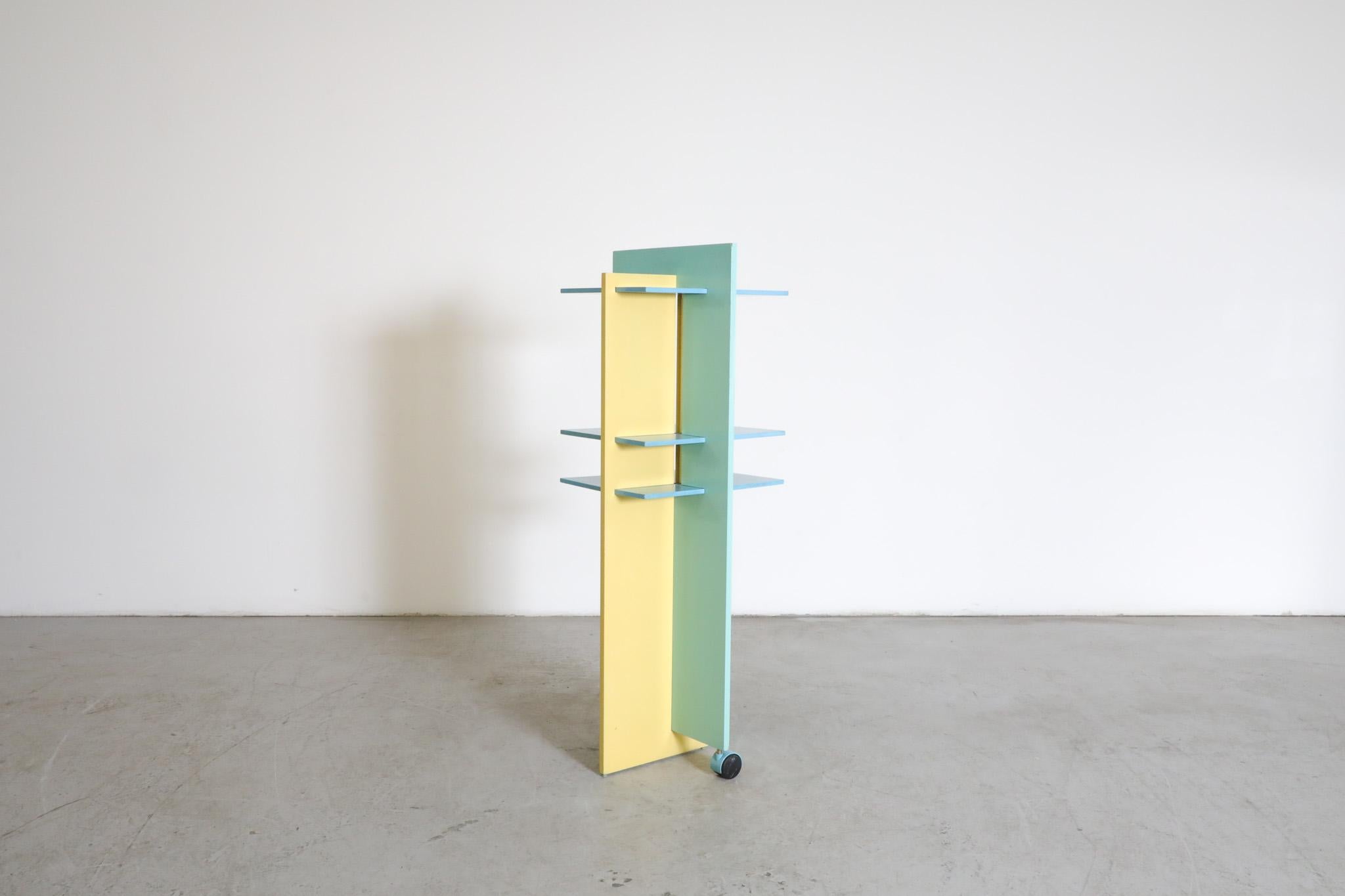 Mid-20th Century Memphis Claudio Salocchi Inspired Blue & Yellow Revolving Bookcase For Sale